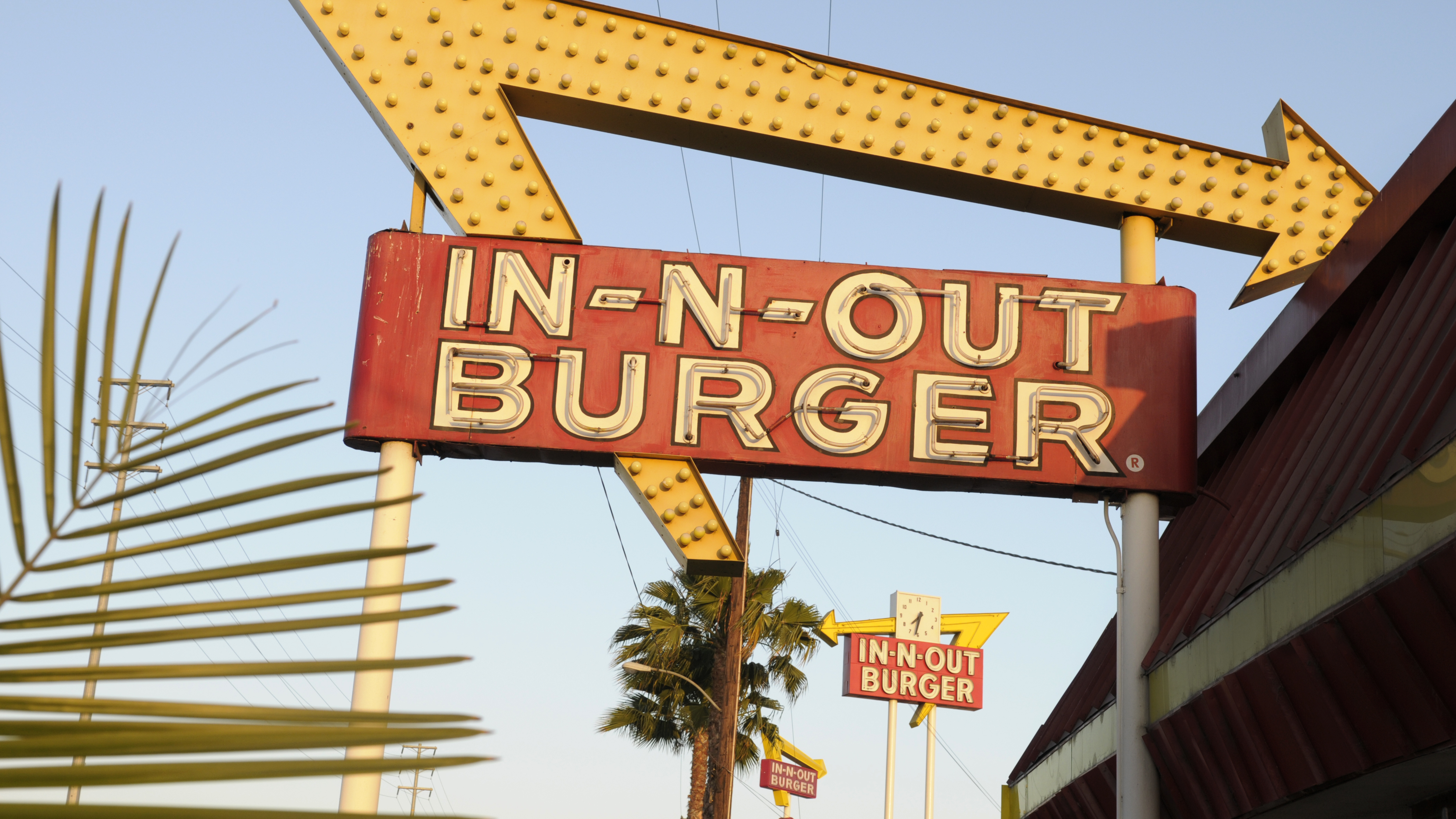 An In-N-Out Burger sign, pictured in California in June 2010. City health officials briefly shut down the San Francisco location for not following COVID-19 protocols, though it has since reopened for outdoor dining and takeout.