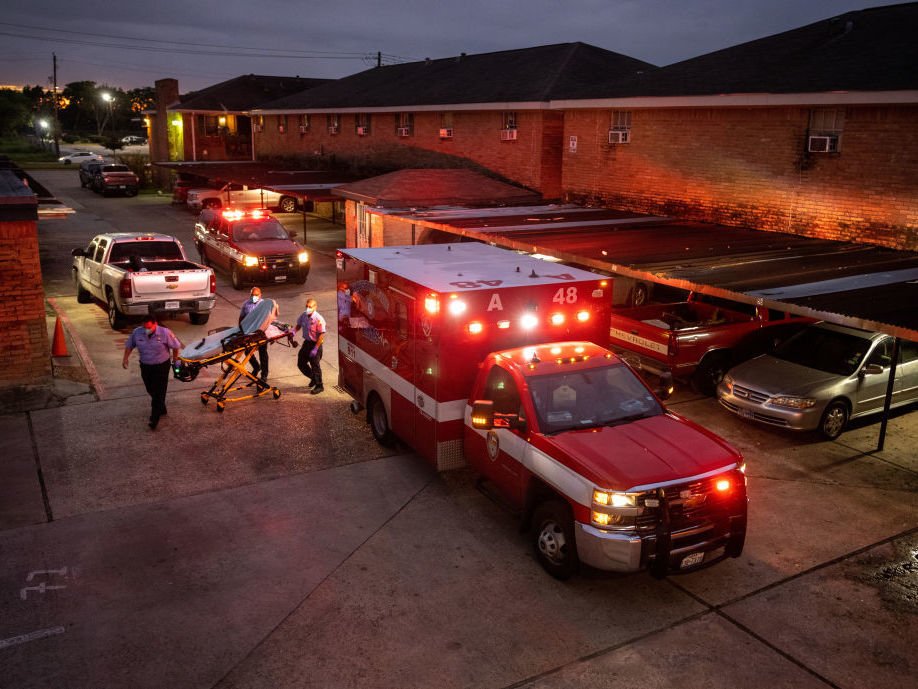 Houston Fire Department paramedics prepare to transport a COVID-19 positive woman to a hospital on September 15, 2021 in Houston, Texas. While the virus is still rampant in the U.S., some vaccinated people will continue to get infected. (Getty Images)