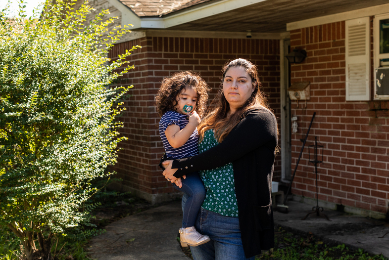 Erica Cuellar, her husband and her daughter moved in with her father in his home early in the pandemic, after she lost her job. She and her husband were worried they wouldn't be able to afford the rent on their house in Houston with only one income. In July 2020, the whole family tested positive for the coronavirus. (Michael Starghill for NPR)