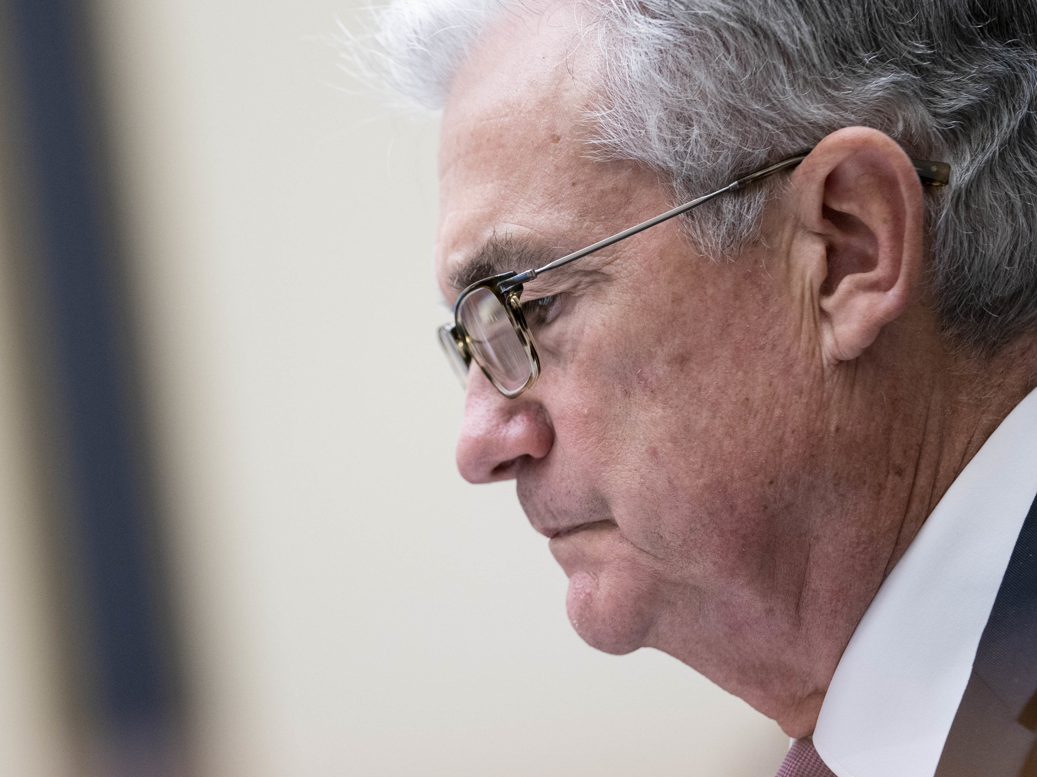 Federal Reserve Chairman Jerome Powell testifies at a House Financial Services Committee hearing on Capitol Hill in Washington, D.C., on Sept. 30. The Fed announced new restrictions on investments by senior officials after being rocked by a controversy involving trading by two regional Fed bank presidents last year. (Pool/Getty Images)