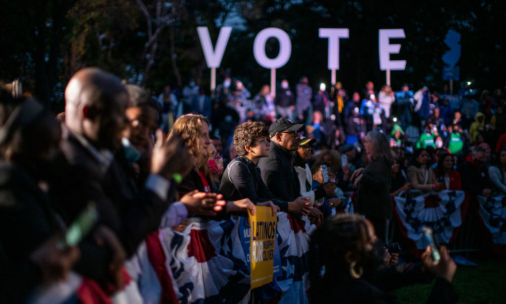 Attendees listen to former President Barack Obama during an early vote rally for New Jersey Gov. Phil Murphy on Oct. 23 in Newark, N.J. That gubernatorial race and the one in Virginia are drawing national attention one year after the presidential election. (Getty Images)