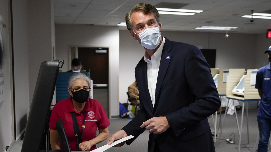 Virginia Republican gubernatorial candidate Glenn Youngkin casts his ballot early, in September. Youngkin has walked a tight rope on voting issues ahead of Tuesday's election.