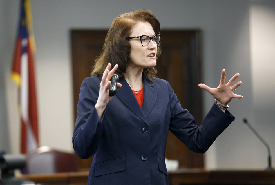 Prosecutor Linda Dunikoski speaks during opening statements in the trial of Gregory McMichael, his son, Travis McMichael, and a neighbor, William "Roddie" Bryan, at the Glynn County Courthouse on Friday in Brunswick, Ga. The three men are charged with the February 2020 slaying of 25-year-old Ahmaud Arbery. (Octavio Jones/AP)