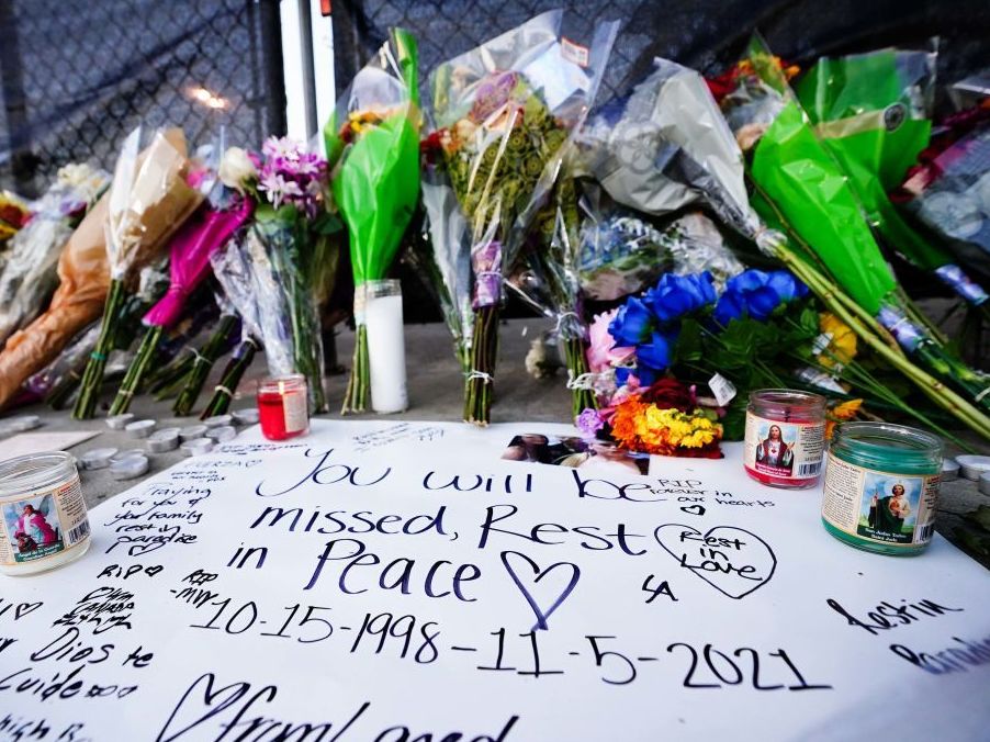 Candles, flowers and letters were placed at a memorial outside the canceled Astroworld music festival at NRG Park in Houston on Sunday. (Getty Images)
