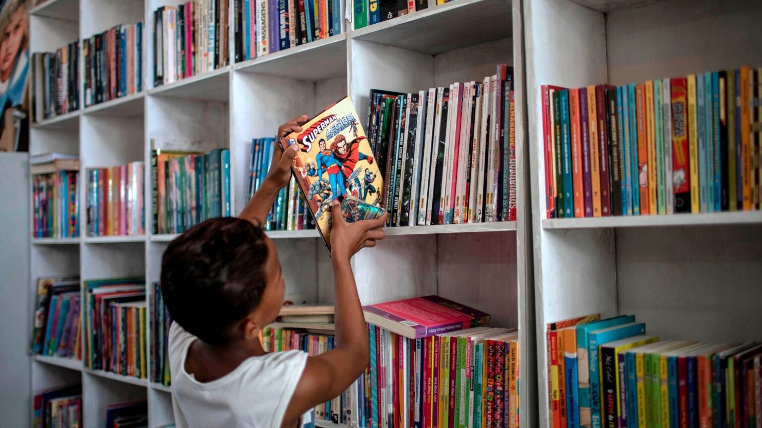 Across the country, parents are challenging the books their kids have access to in the classroom. Increasingly, those books are about race. (AFP via Getty Images)