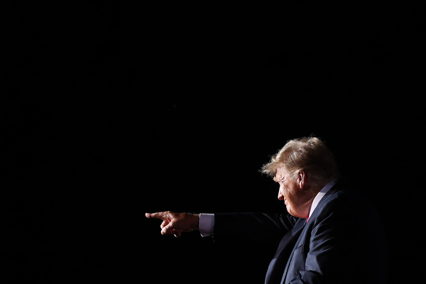 Former President Donald Trump addresses supporters during an August rally in Cullman, Ala.