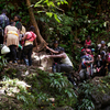 A once-remote patch of rainforest is now packed with migrants trying to reach the U.S.