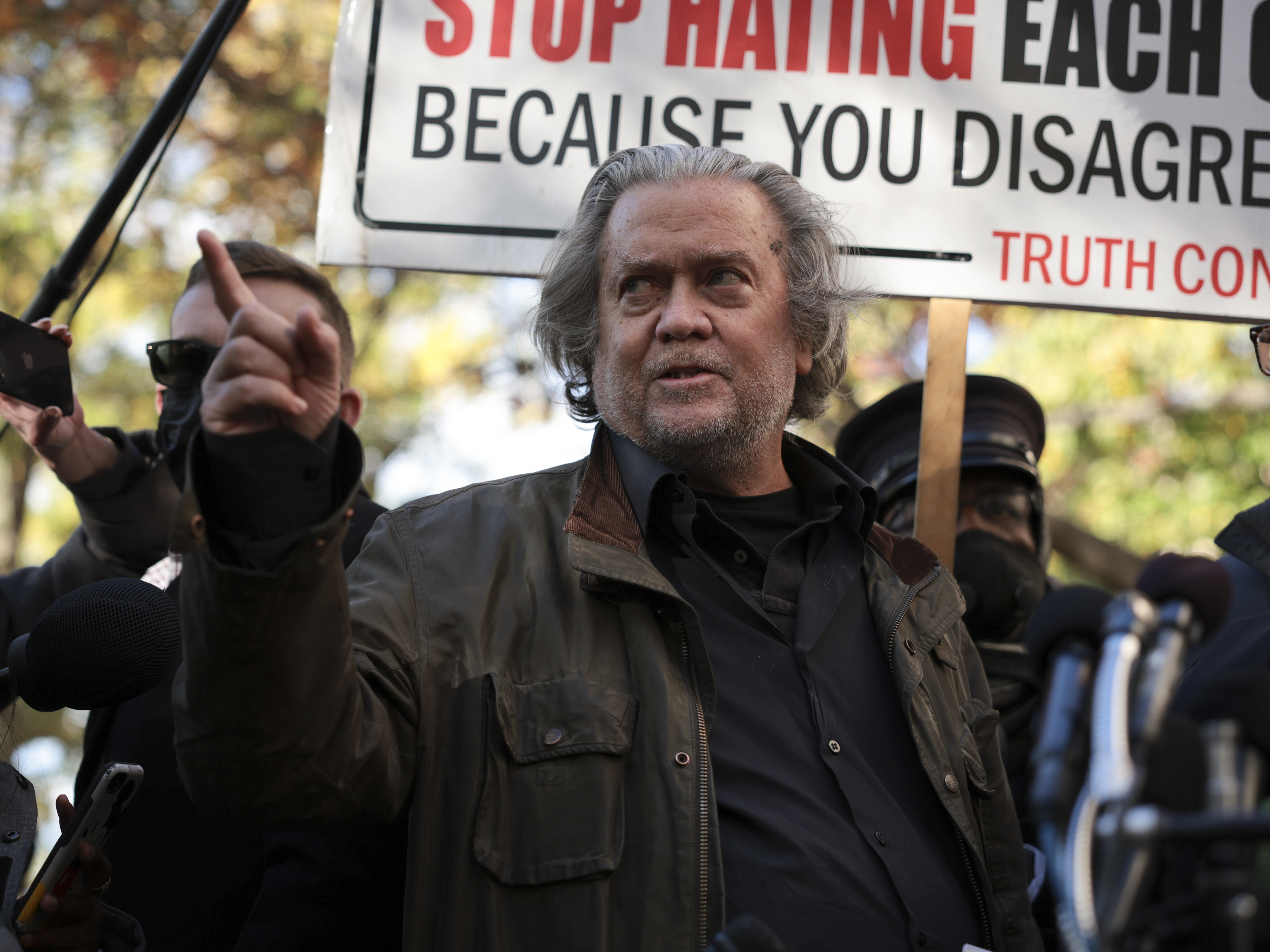 Steve Bannon speaks to reporters outside of the federal district courthouse in Washington, D.C., on Monday. Bannon was indicted last week on two counts of contempt of Congress. Steve Bannon pleads not guilty to contempt of Congress charges