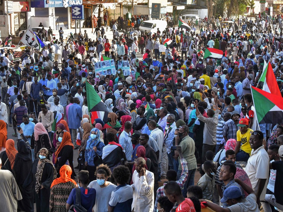 Sudanese anti-coup protesters take part a demonstration in the