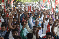 Supporters of All India Kisan Sangharsh Coordination Committee, a group of farmers' organizations, hold flags during a protest to mark one year since the introduction of divisive farm laws and to demand the withdrawal of the Electricity Amendment Bill, in Hyderabad, India, on Thursday.