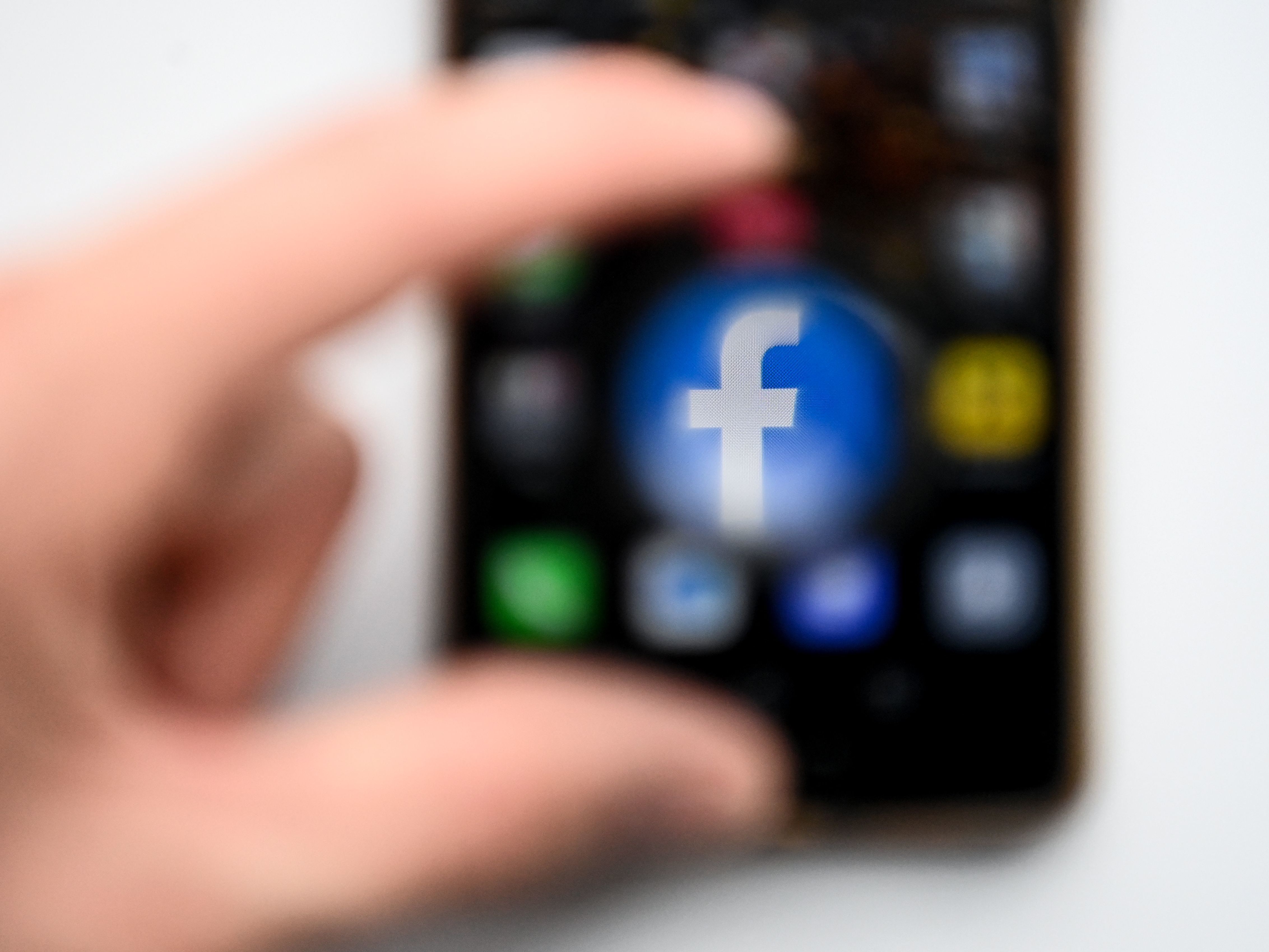 Meta has removed six networks of accounts for abusing its platforms, underscoring the ways bad actors around the world use social media as a tool to promote false information and harass opponents. (AFP via Getty Images)