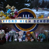 Michigan authorities consider charges against the school shooting suspect's parents