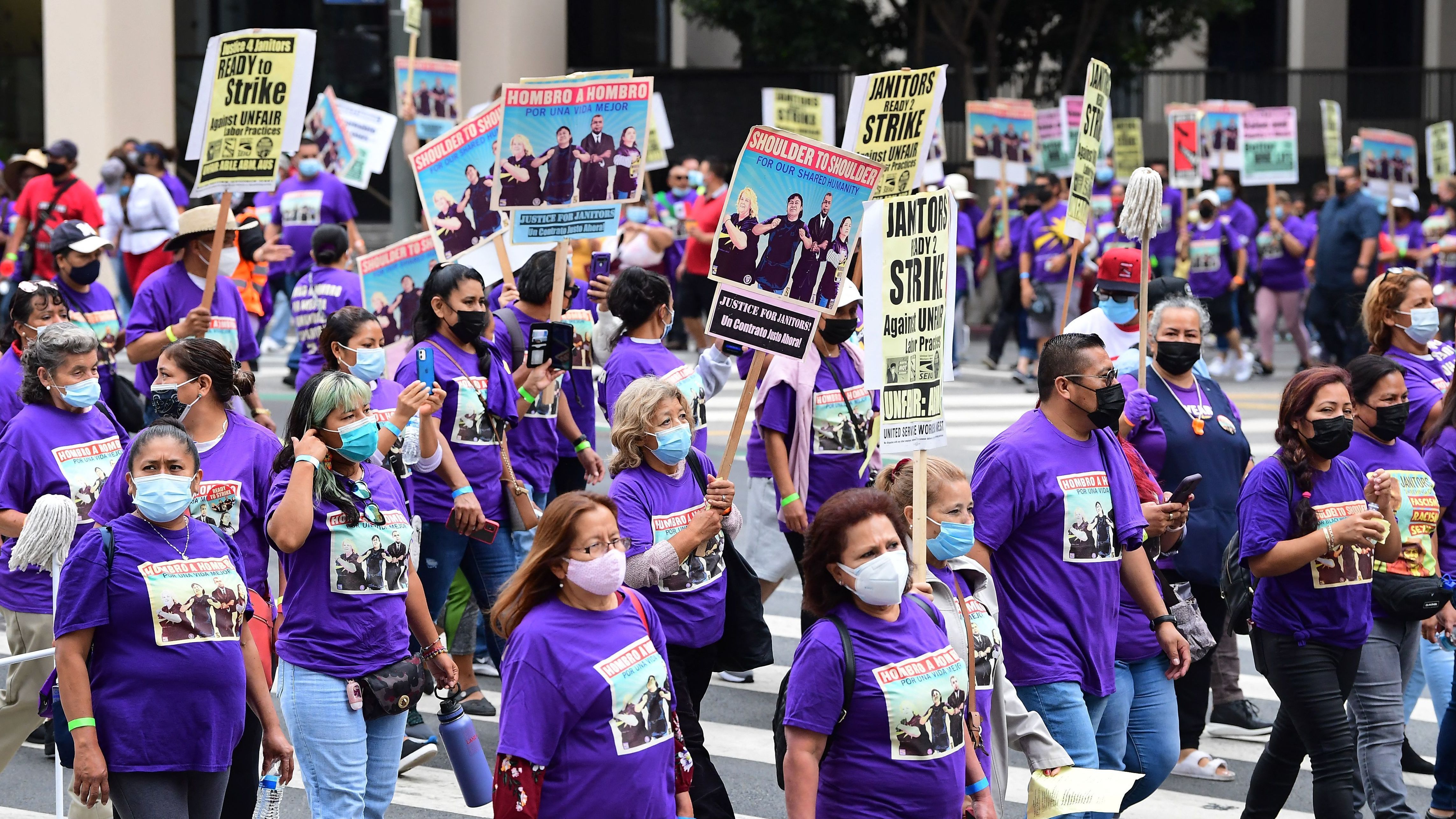 In August of 2021, more than 1,000 janitors with the Service Employees International Union (SEIU) rallied and marched in Los Angeles, California ahead of their as their contracts expiring. (AFP via Getty Images)
