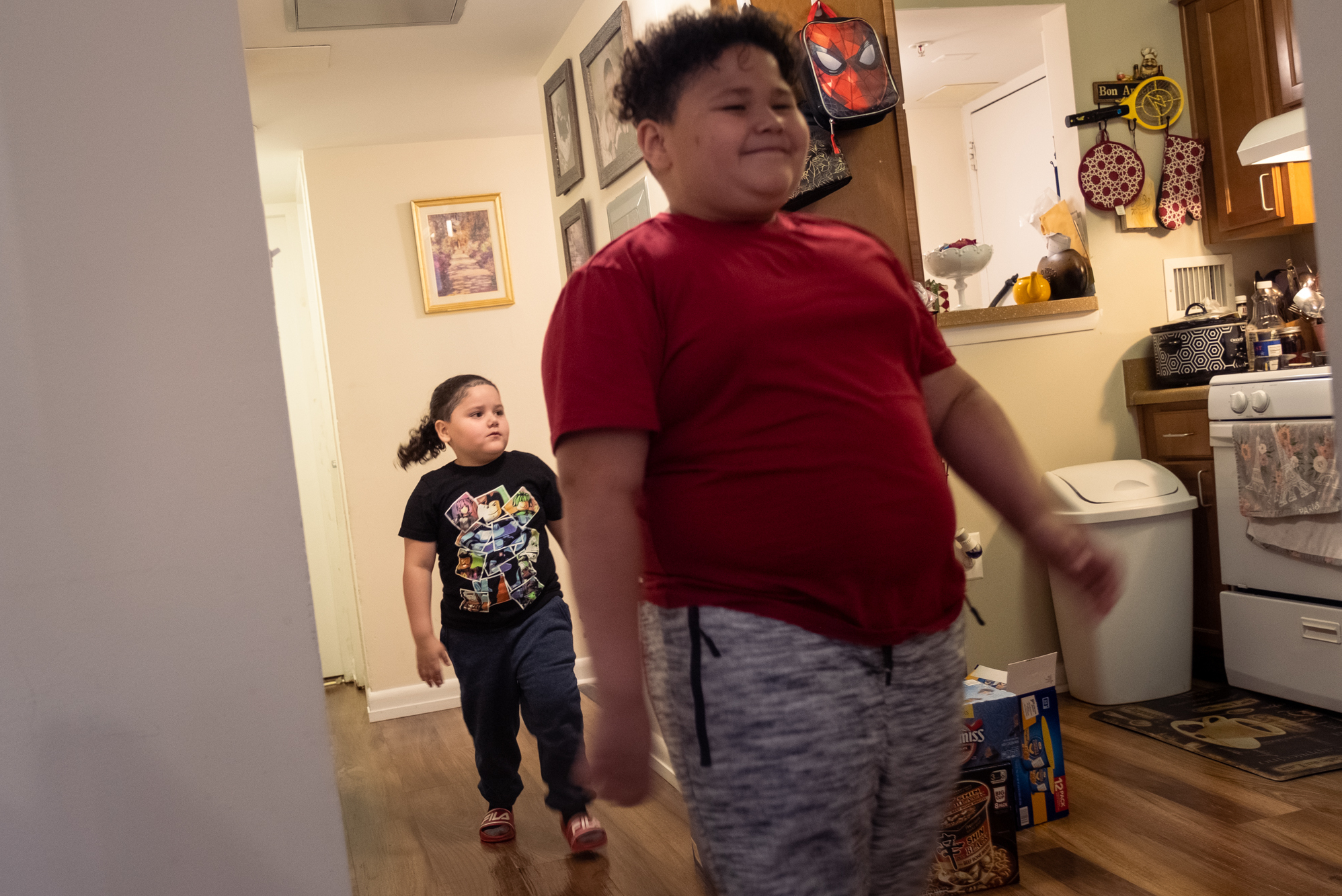 Yariel with his older brother Dylan, 8 at home in Takoma, Md.