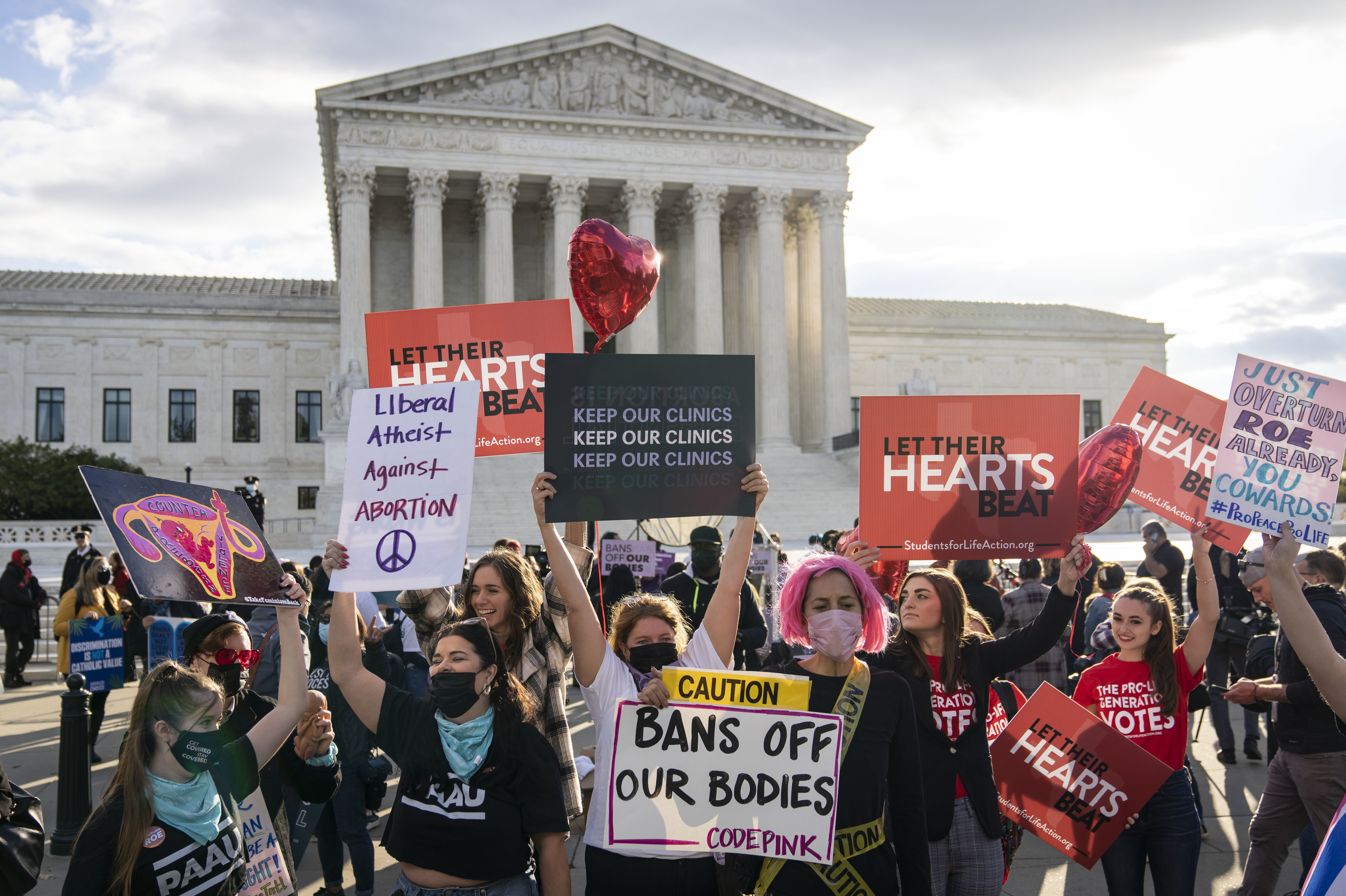 Abortion-rights supporters and anti-abortion demonstrators rally outside the U.S. Supreme Court last month in Washington, D.C. (Getty Images)