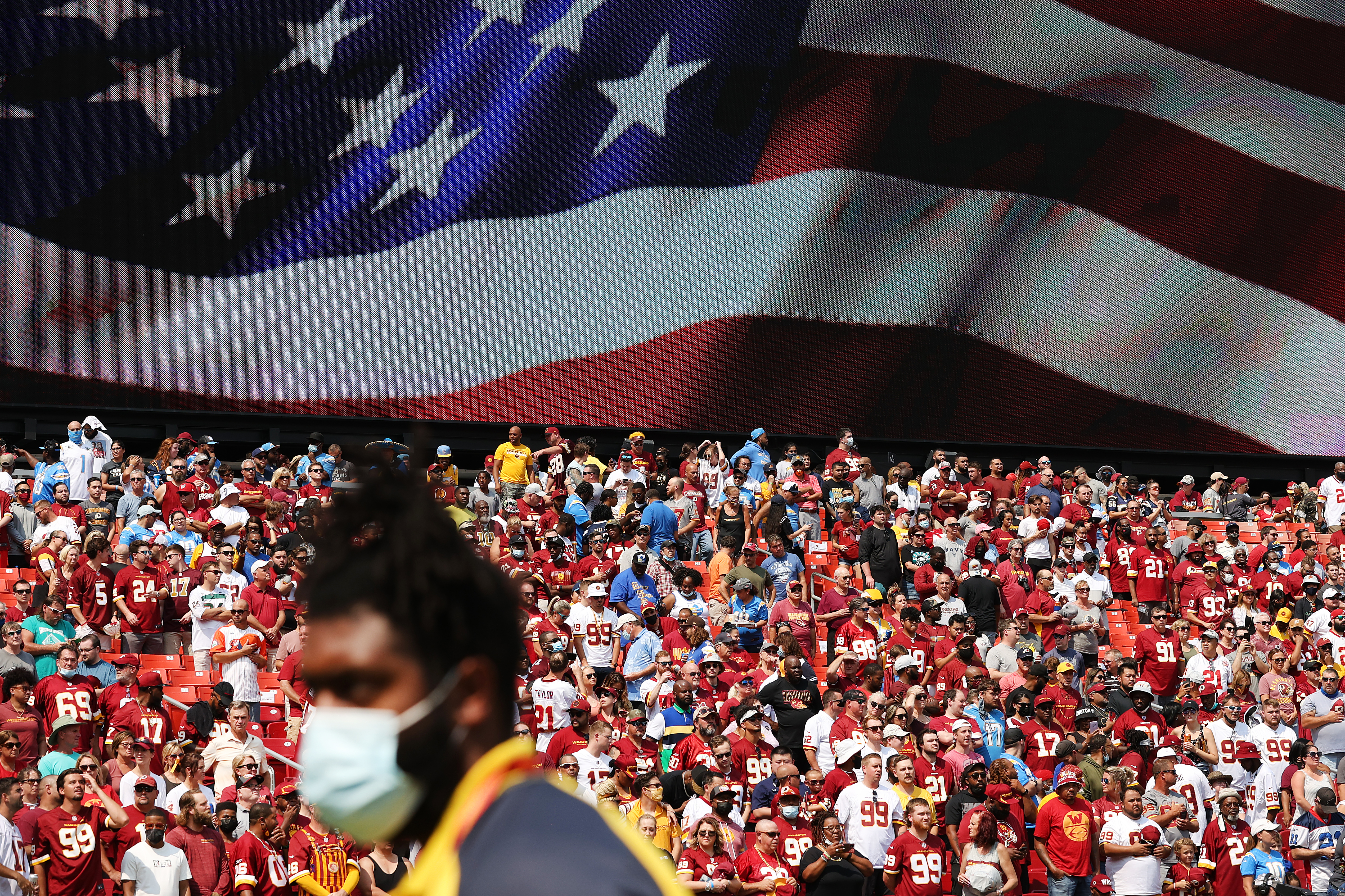 In the past three days, nearly 100 NFL players have tested positive for COVID-19. (Getty Images)