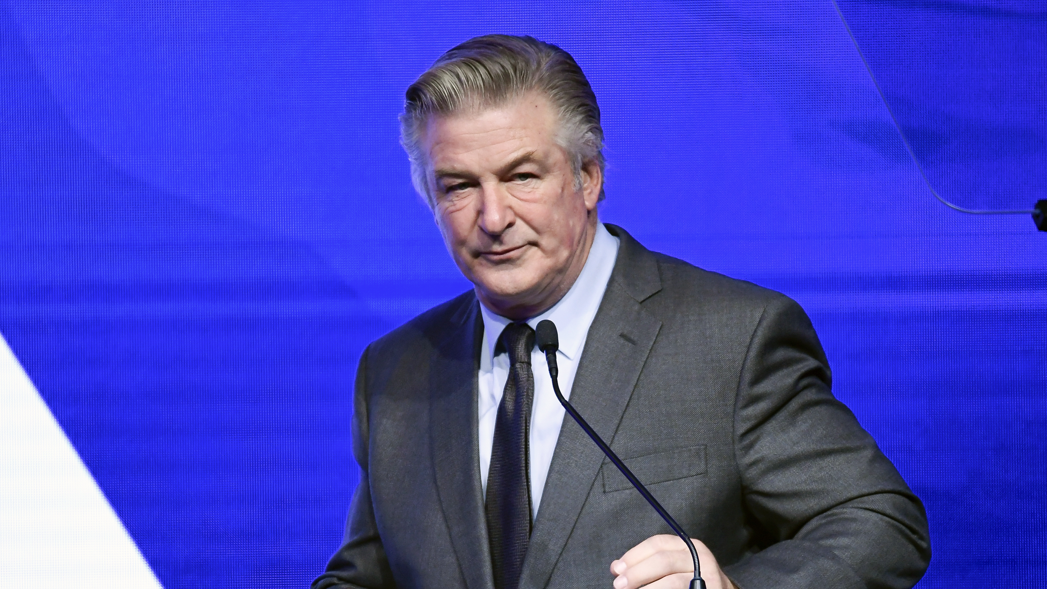 Alec Baldwin performs emcee duties at the Robert F. Kennedy Human Rights Ripple of Hope Award Gala at New York Hilton Midtown earlier this month in New York. Authorities on Thursday issued a search warrant for Baldwin