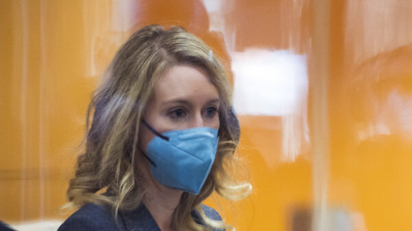Elizabeth Holmes in a mask in court