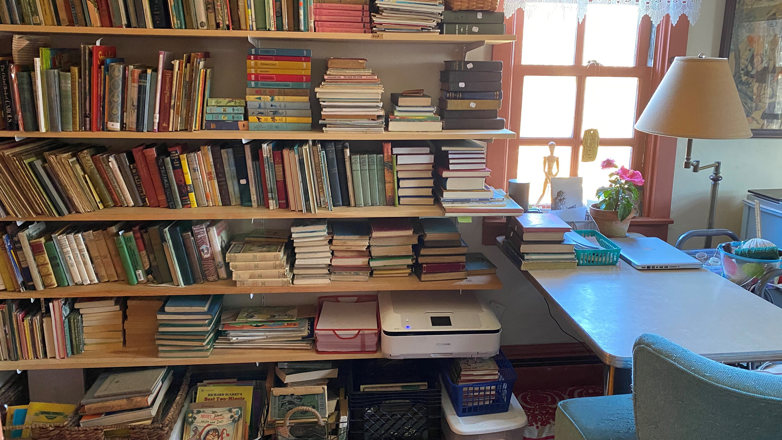 One of many bookshelves in the home of Marie-Pascale Traylor, the artist and former preschool teacher behind the "My Old Books" Instagram account and Etsy shop. She collects vintage children