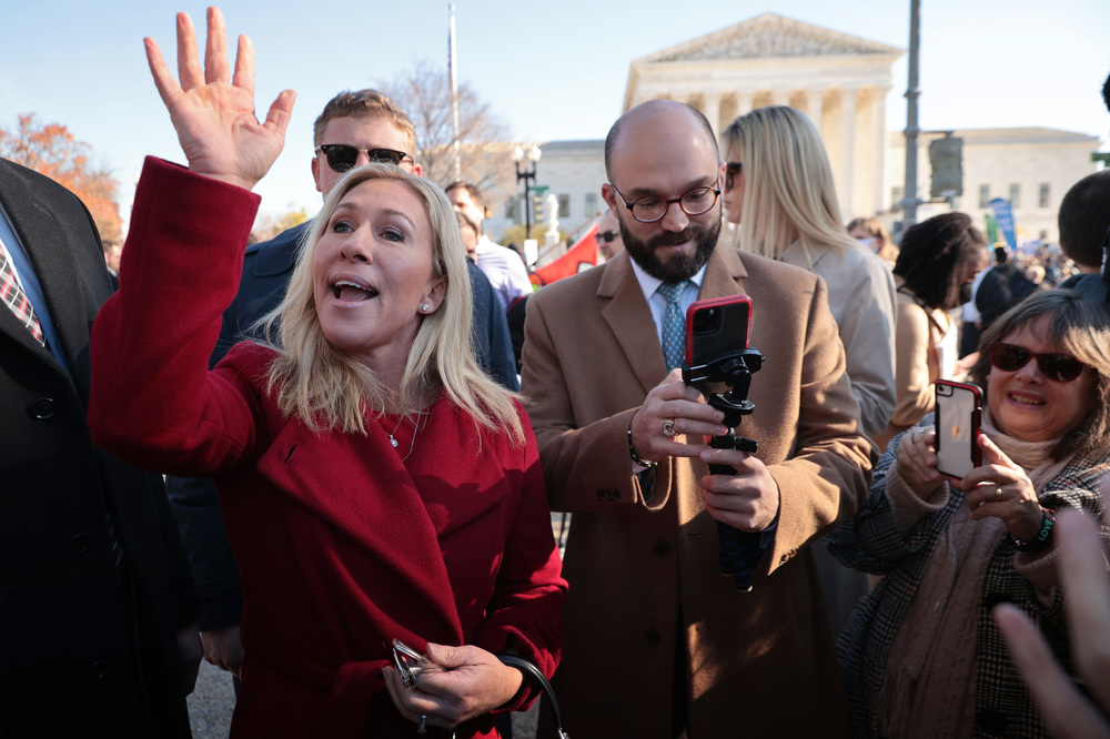 Rep. Marjorie Taylor Greene, R-Ga., joins fellow anti-abortion activists in front of the U.S. Supreme Court on Dec. 1, 2021, as the justices hear arguments on a case about a Mississippi law that bans most abortions after 15 weeks. (Getty Images)