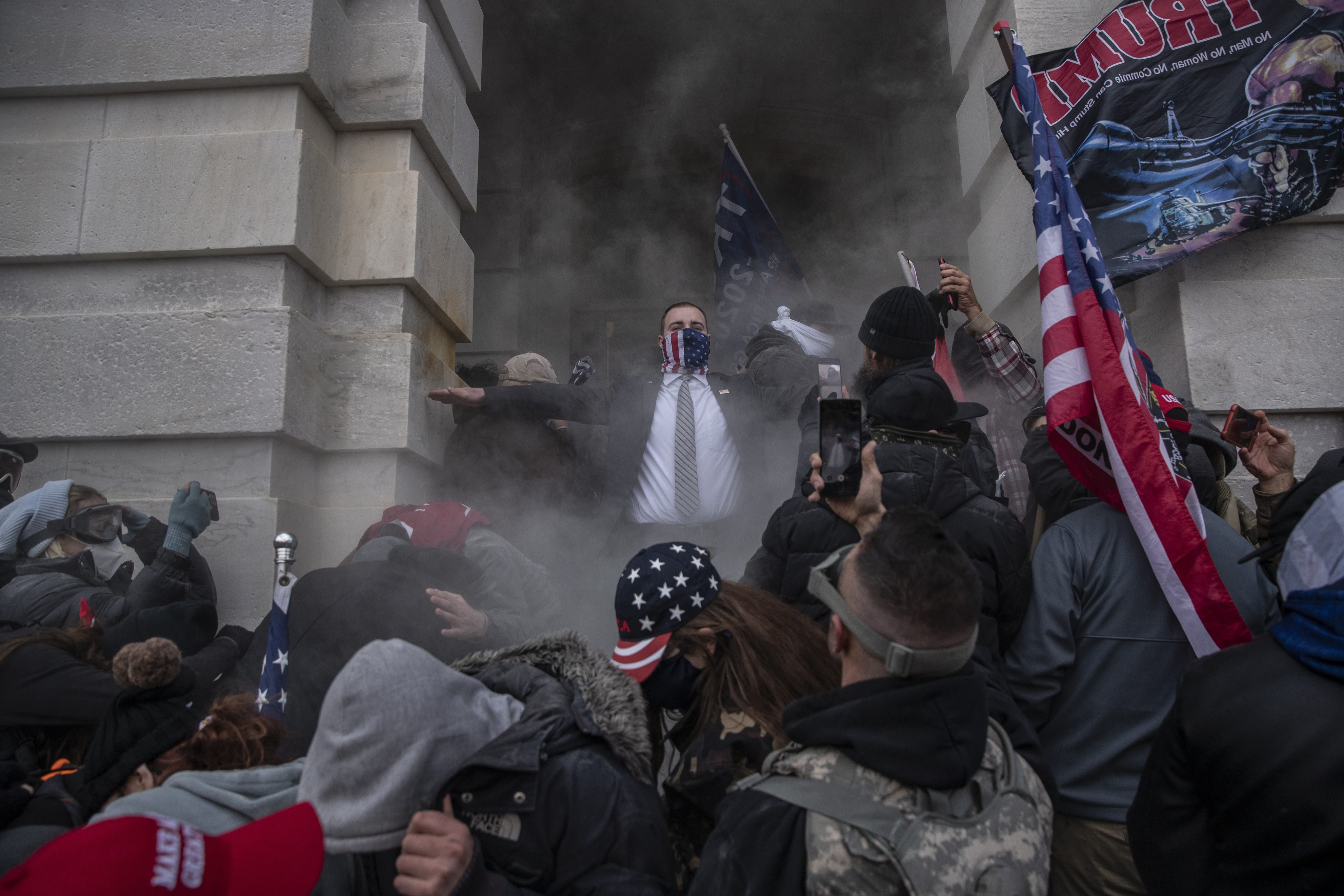In the year since the Jan. 6, 2021, riot at the U.S. Capitol, federal prosecutors have charged more than 700 people related to the attack. (Bloomberg via Getty Images)