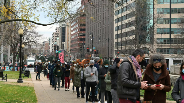 People line up for a COVID-19 test in Washington, D.C. on Monday.