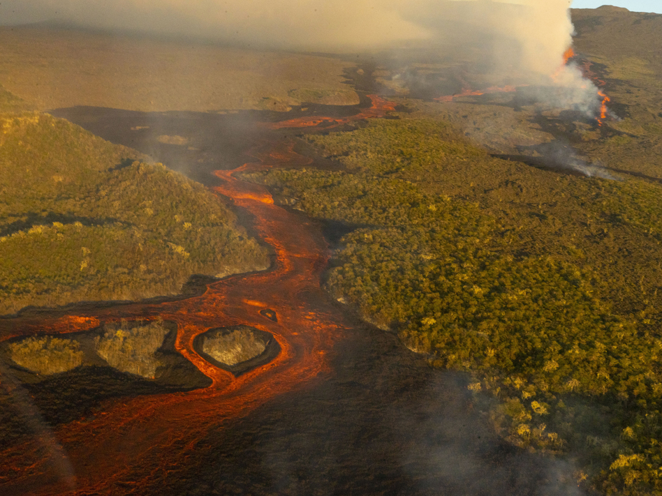 This photo released by the the National Galapagos Park communications office shows lava from the eruption of Wolf Volcano on Isabela Island, Galapagos Islands, Ecuador, on Friday. (Wilson Cabrera/National Galapagos Park communications office via AP)
