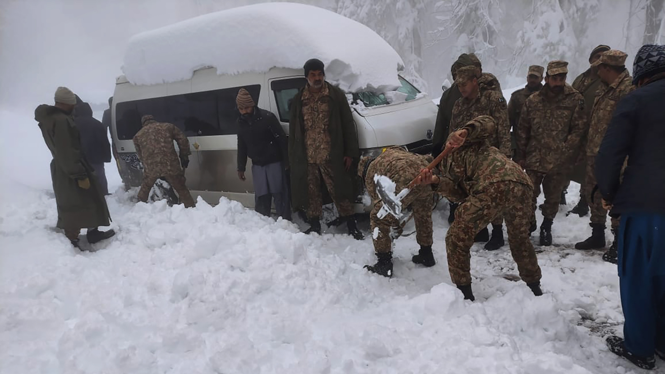 22 people die in cars stuck in heavy snow in Pakistan : NPR