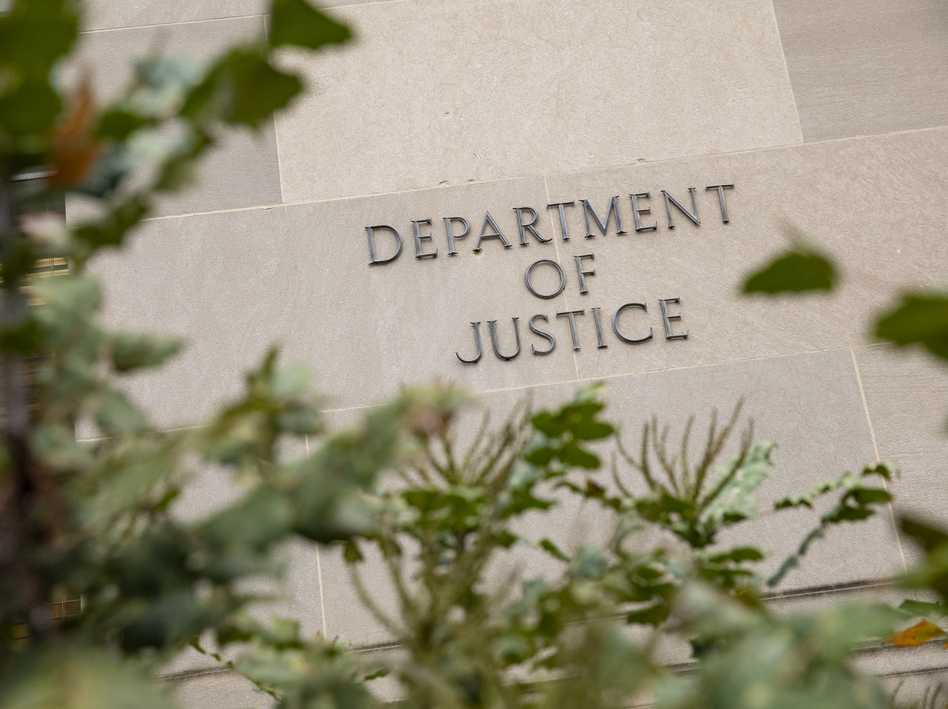 The Justice Department building on a foggy morning in 2019 in Washington, D.C. (Samuel Corum/Getty Images)