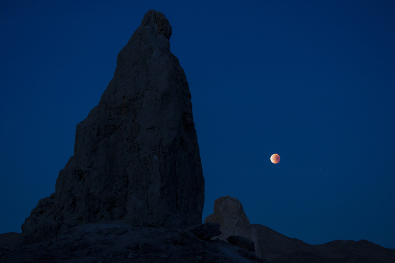 A lunar eclipse viewed from California's Trona Pinnacles Desert National Conservation Area. Scientists believe there may be more moons in the galaxy than planets. (NASA/Lauren Hughes/NASA/Lauren Hughes)