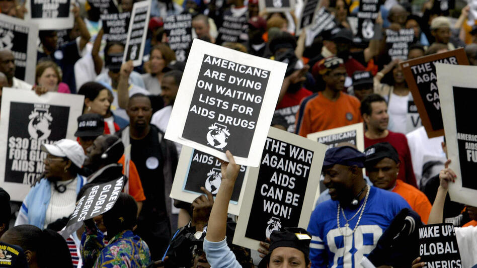 ACT UP's direct action spread awareness about AIDS in the late 1980s. In this photo from 2004, ACT UP protesters are gathered in Washington, DC. (TIM SLOAN/AFP via Getty Images)