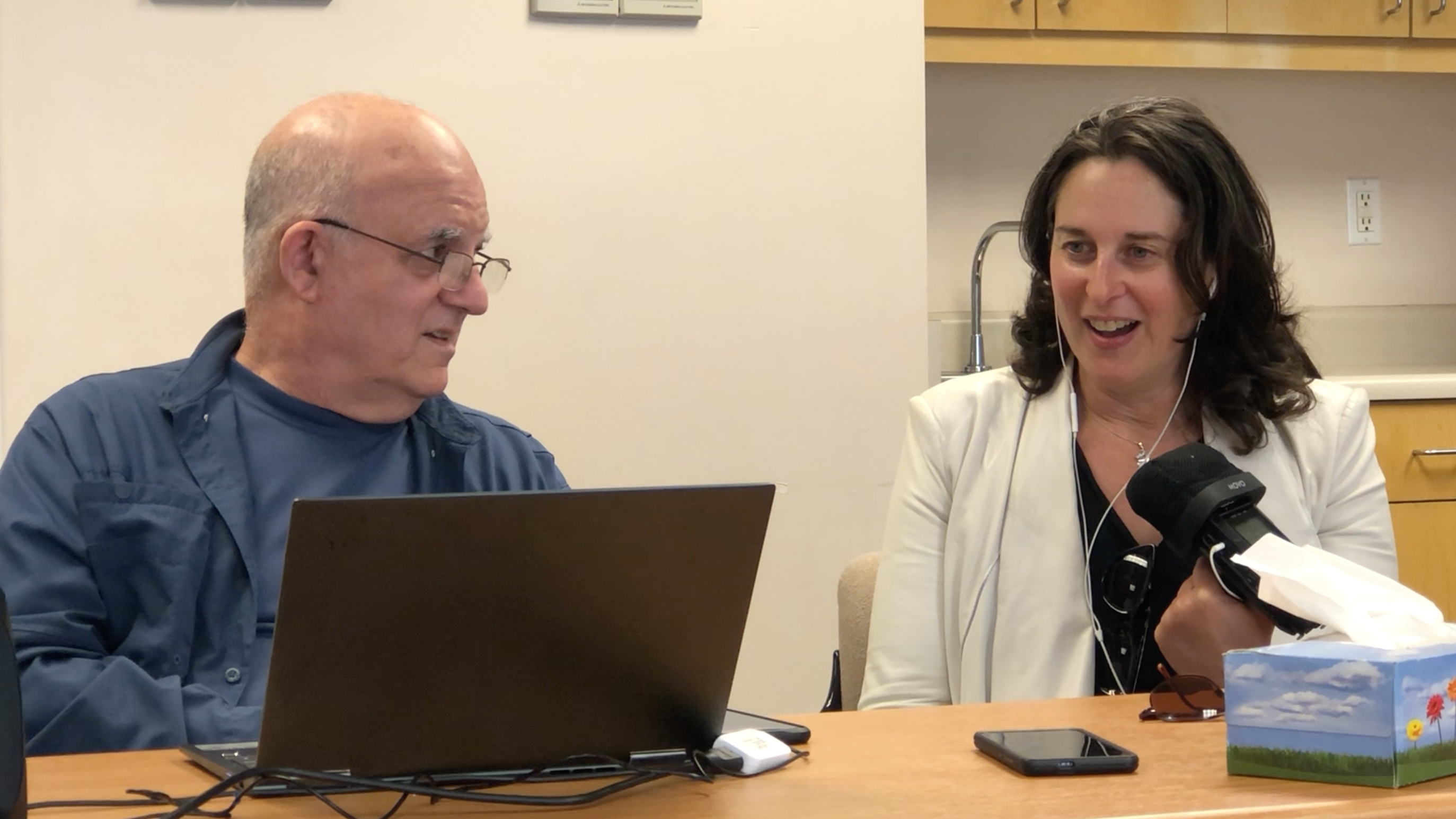 Reporter Chloe Veltman reacts to hearing her digital voice double, &quot;Chloney,&quot; for the first time, with Speech Morphing chief linguist Mark Seligman. (Courtesy of Speech Morphing)
