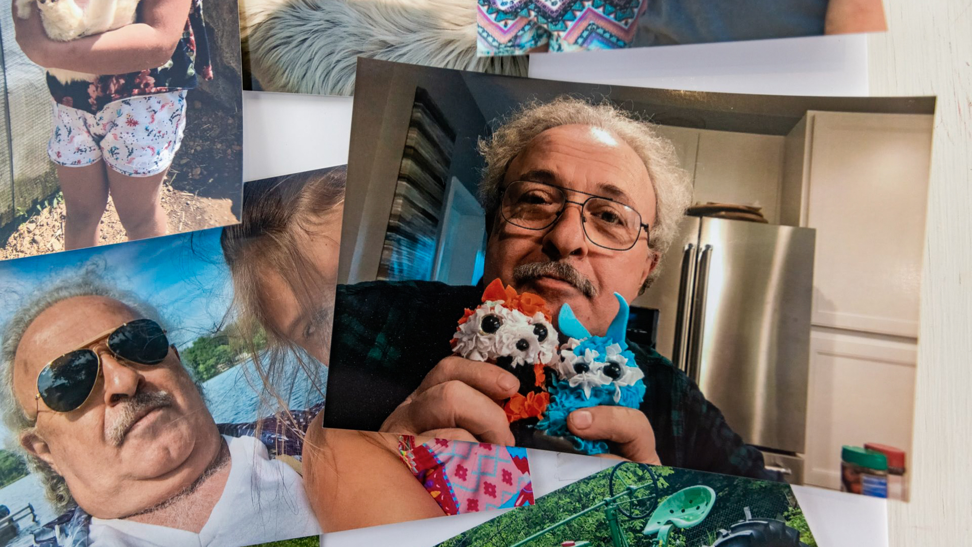 A photo of Tony Tsantinis hangs in a collage set up for a celebration of his life on the final day that Athens Pizza in Brimfield, Mass., was open for business. Tsantinis, who owned the pizzeria for many years, died of COVID-19 last month when efforts to find space at a hospital that could offer him a higher level of care could not be found.