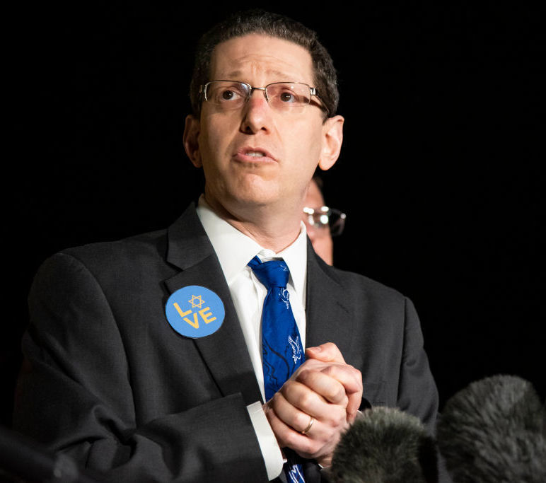 Rabbi Charlie Cytron-Walker talks to reporters following a special service arranged days after a 44-year-old British national held the rabbi and three others hostage inside the Congregation Beth Israel synagogue in Colleyville, TX. (Getty Images)