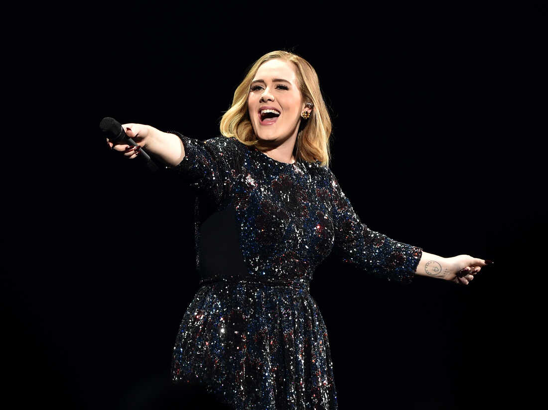 Adele postpones Las Vegas residency in tearful video: 'I'm gutted' : NPR