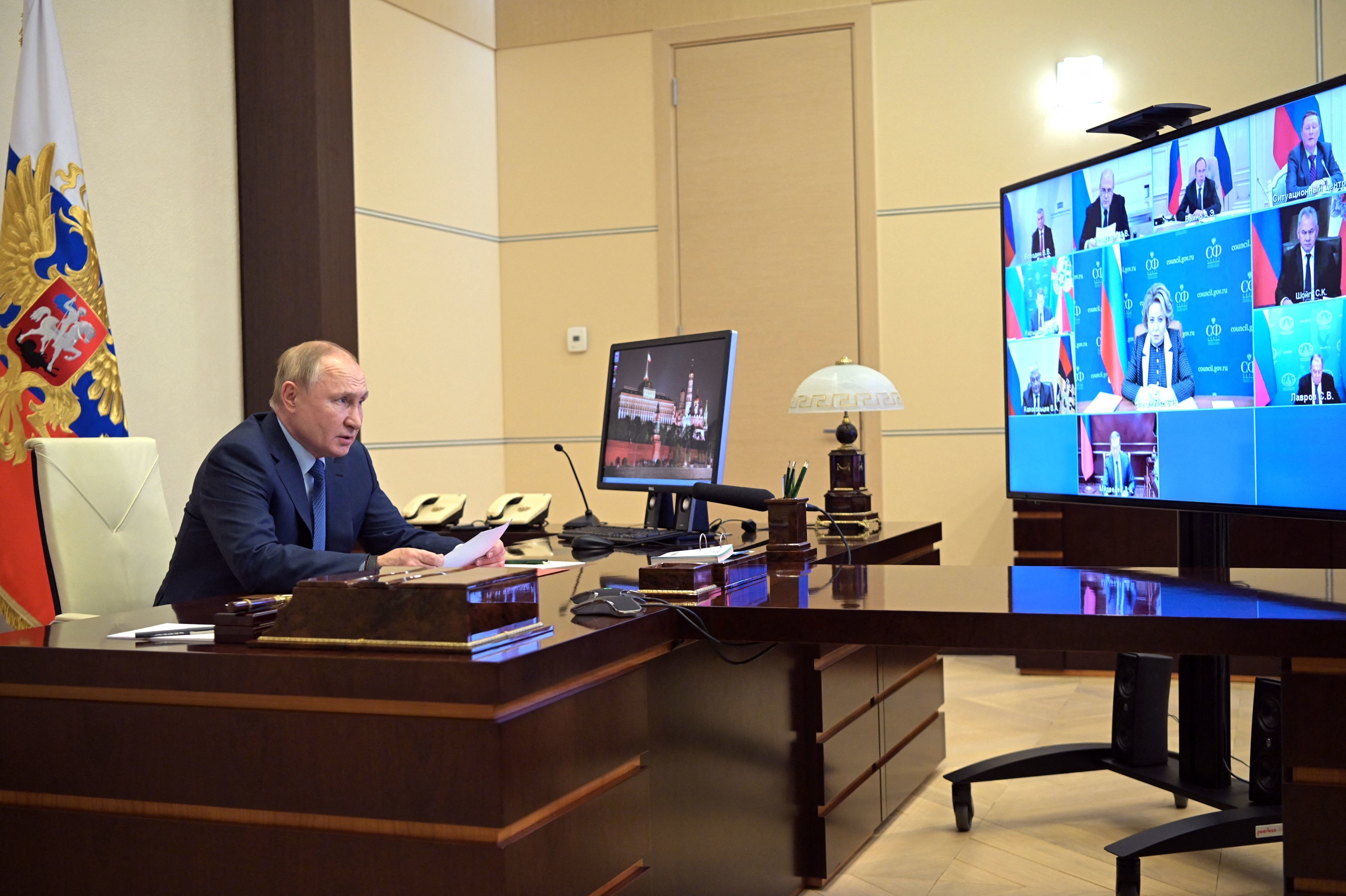 Russian President Vladimir Putin chairs a meeting with members of the U.N. Security Council via a videoconference at the Novo-Ogaryovo state residence outside Moscow on Friday. (Sputnik/AFP via Getty Images)