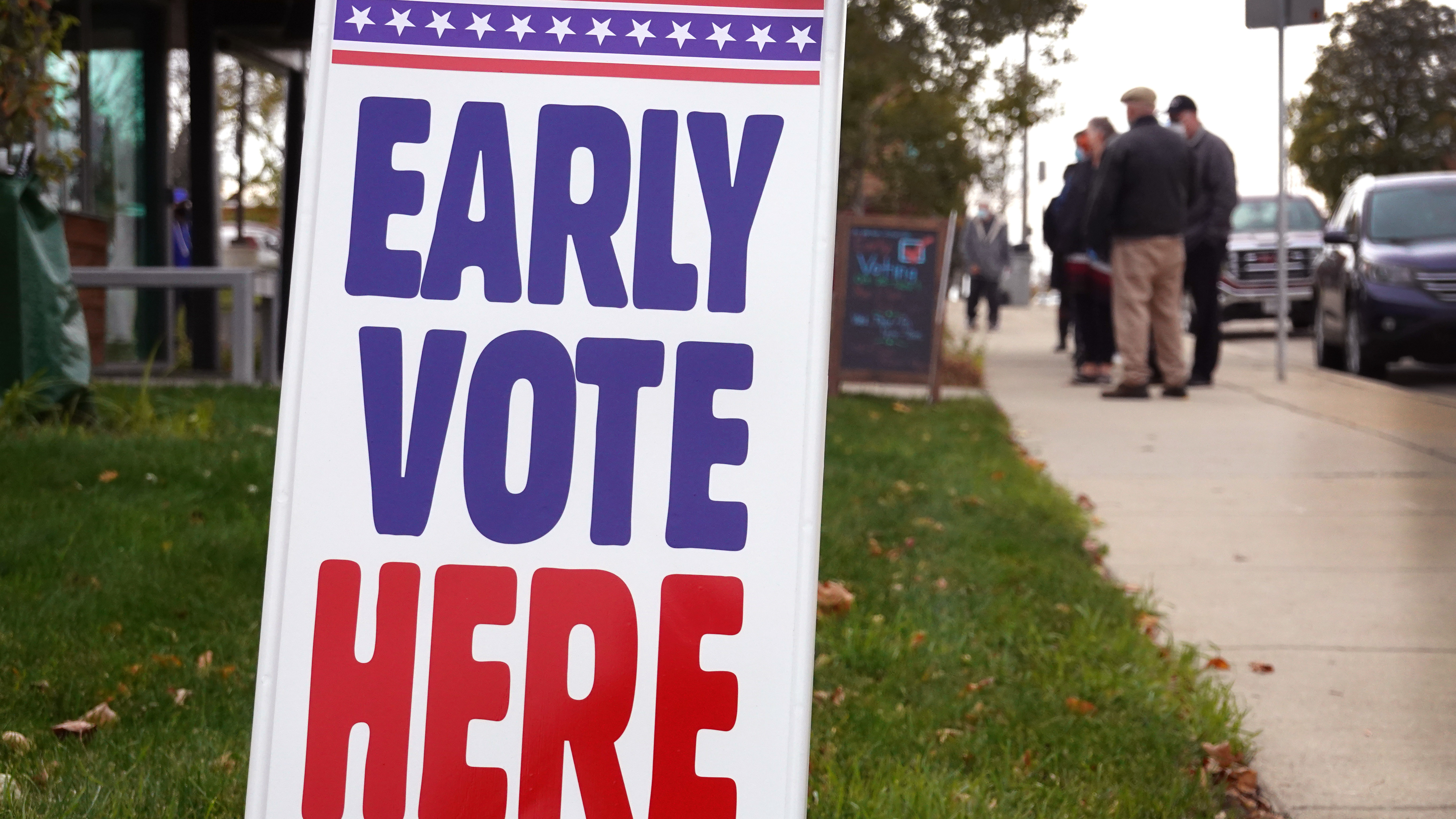 Residents wait in line to vote outside of the Tippecanoe branch library on Oct. 20, 2020, in Milwaukee, Wis. Minimum standards for access to in-person early voting are one reform that both Republicans and Democrats have backed. (Getty Images)