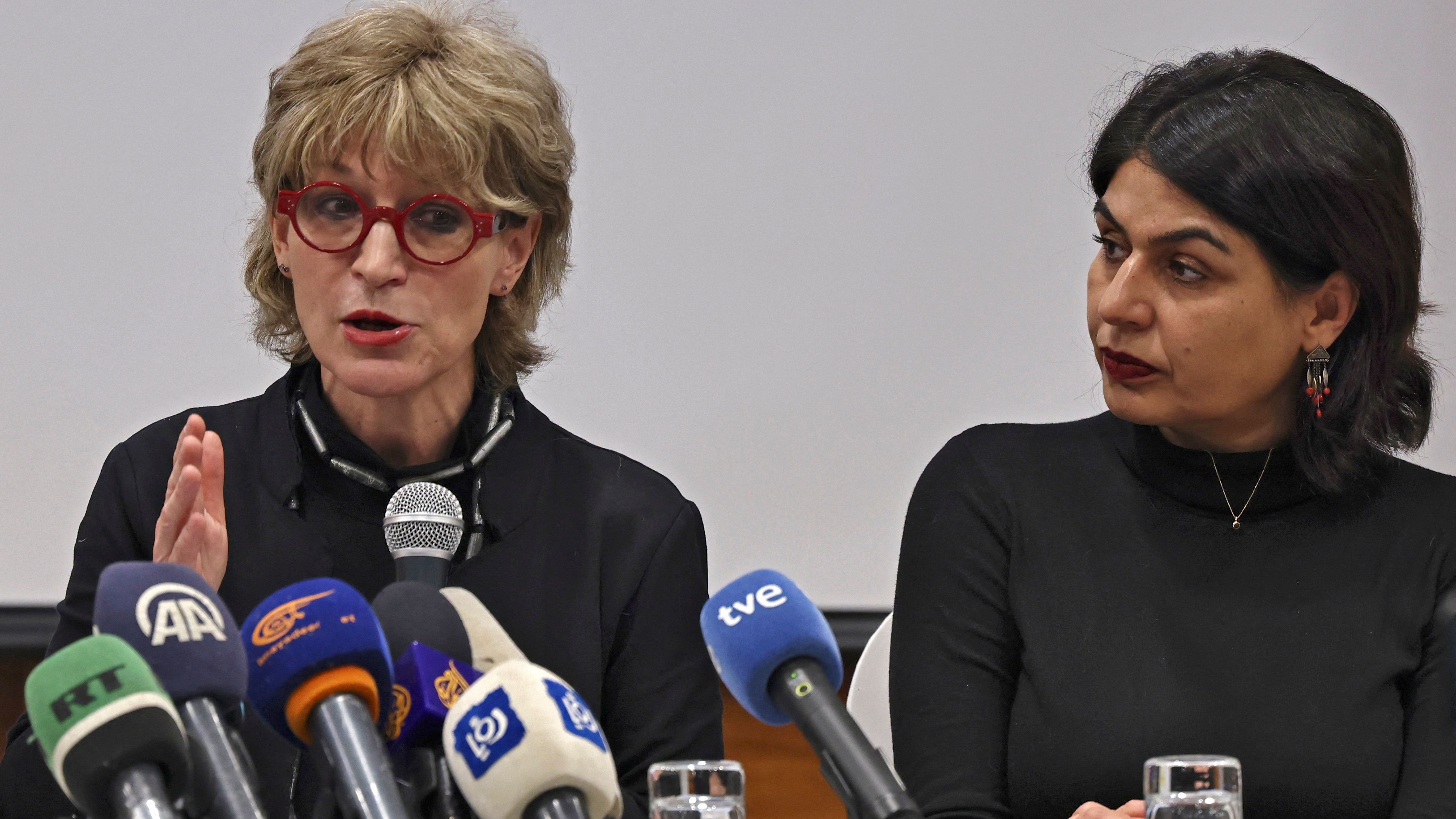 Amnesty International has labeled Israel an apartheid state over its policies toward Palestinians. The Israeli government rejects the accusation. Here, Agnes Callamard, the secretary general of Amnesty International, speaks during a news conference as activist Orly Noy (right) looks on in Jerusalem. (AFP via Getty Images)
