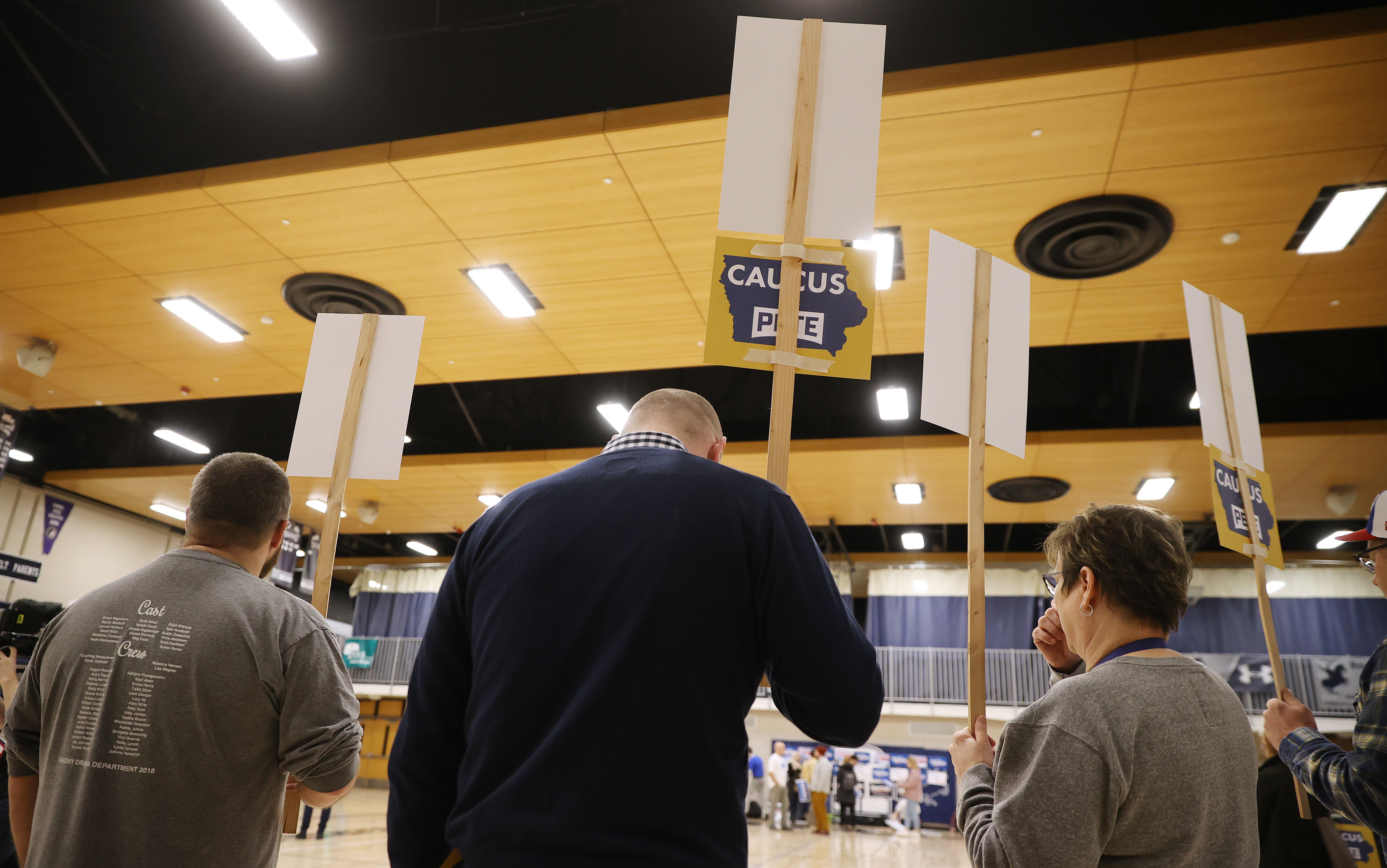 Supporters of then-Democratic presidential candidate Pete Buttigieg prepare to caucus for him in the gym of Roosevelt High School in Des Moines, Iowa, on Feb. 3, 2020. The caucuses were marred by issues and no winner was named. (Getty Images)
