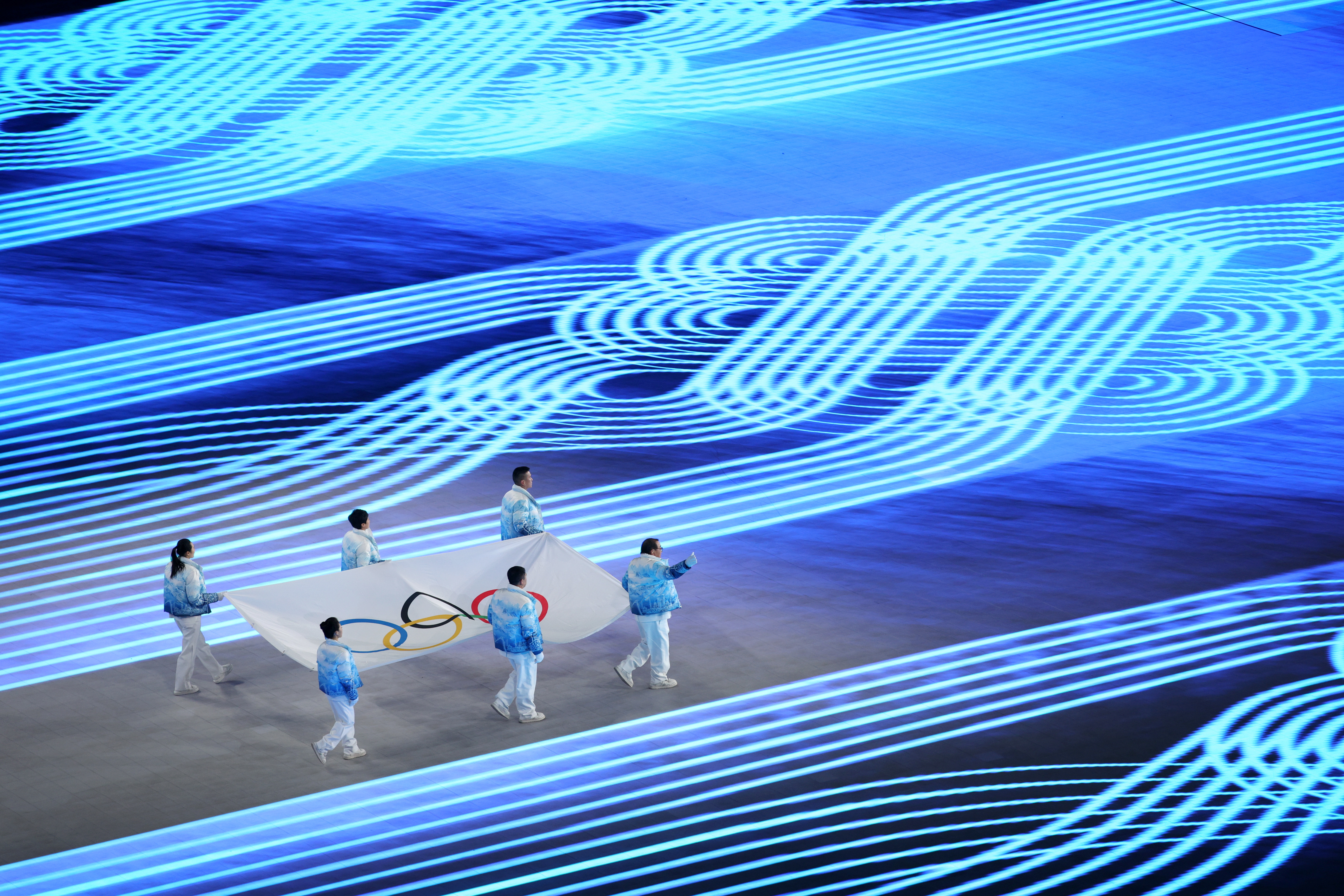 The Winter Games have begun. See photos and highlights from the opening ceremony 10 Zhihuan Luo, Hui Zhang, Jiajun Li, Xue Shen, Xiaopeng Han and Hong Zhang carry the Olympic flag during the opening ceremony.