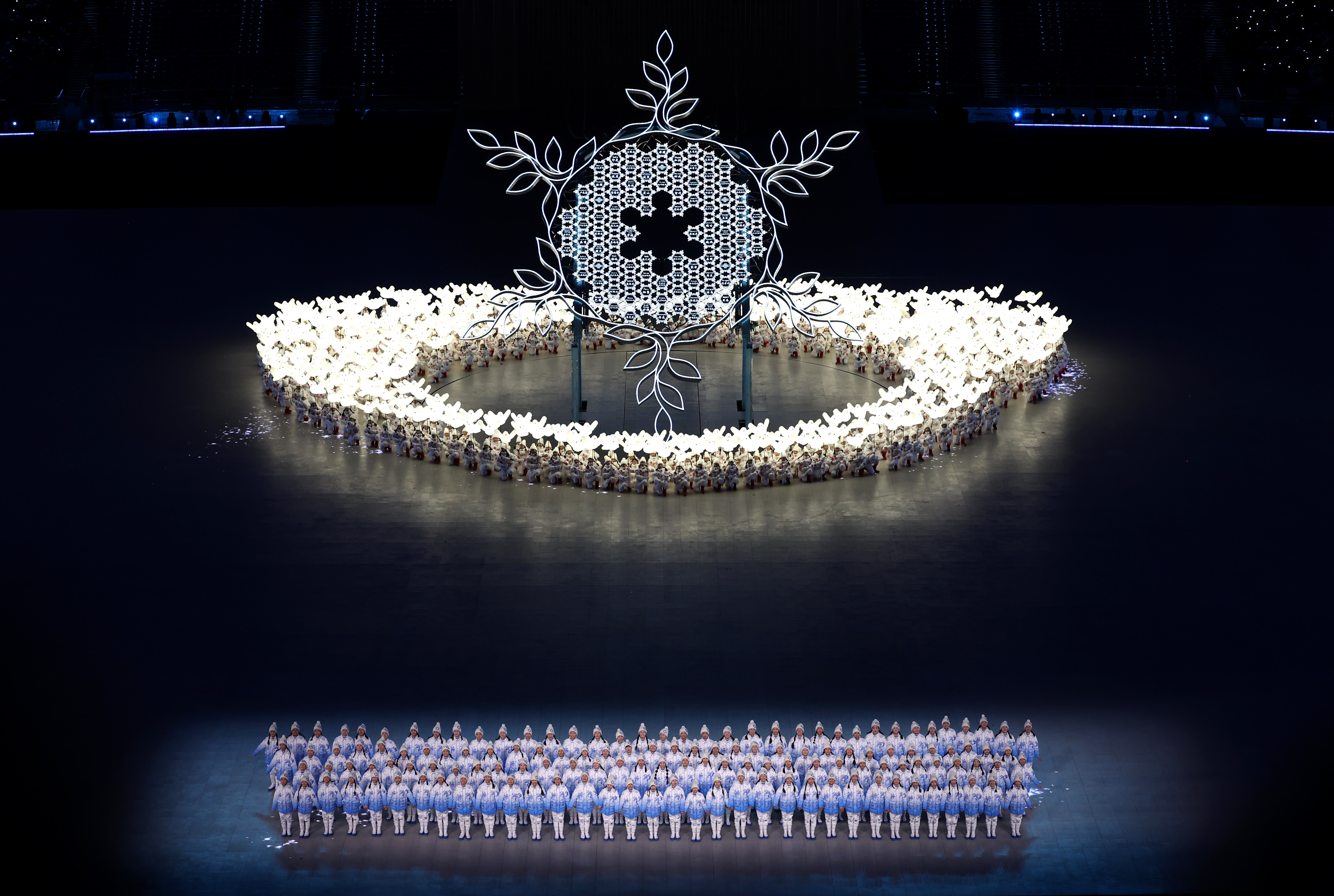 The Winter Games have begun. See photos and highlights from the opening ceremony 17 A large snowflake symbol is seen during a performance at the opening ceremony.