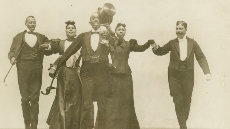 Dancers performing the Cakewalk.