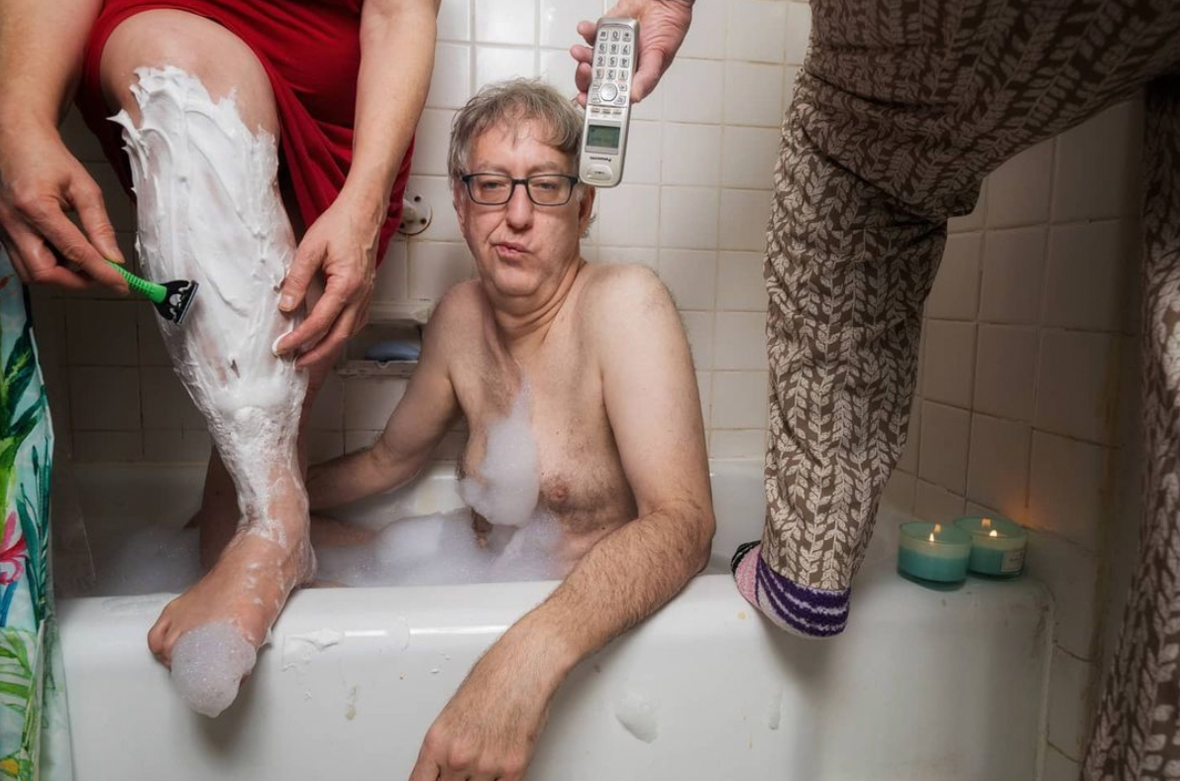 Three's company: A man sticks out the pandemic with his ex-wife and his mother 1 Sophia Lansky, Neil Kramer and Kramer's mother Elaine, crowd into their bathroom in Queens in April 2020 in a staged scene as part of photography project by Kramer.