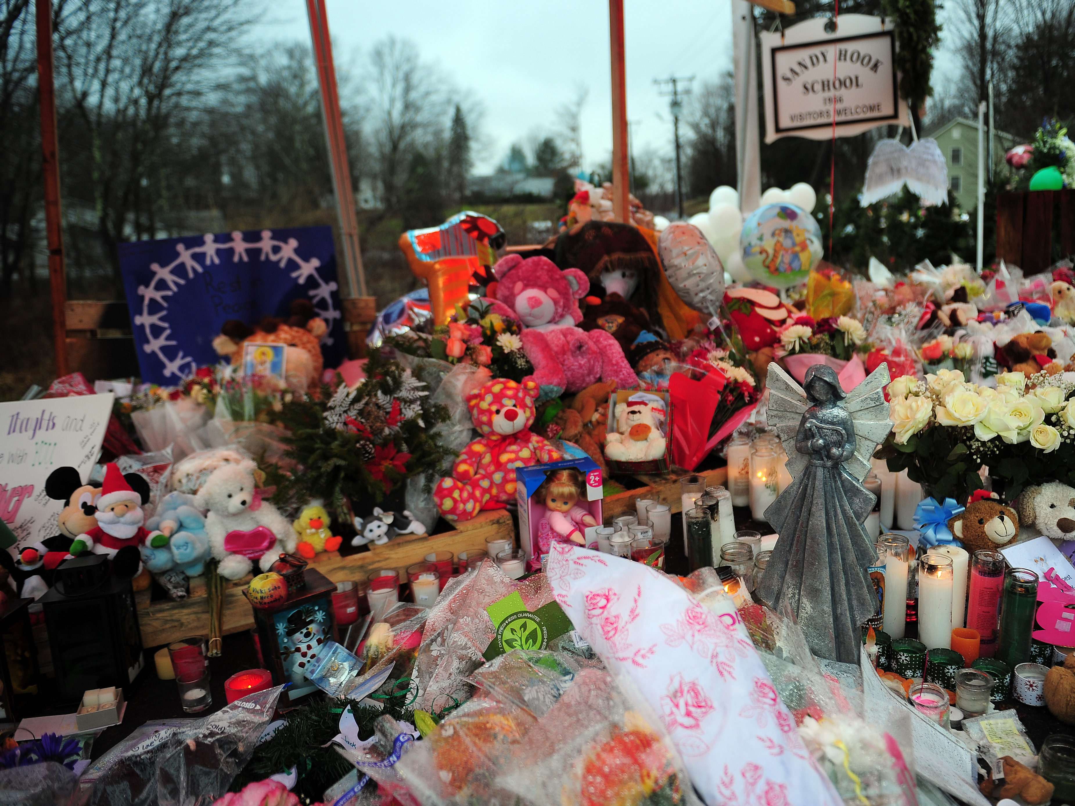 A makeshift shrine to the victims of the Sandy Hook Elementary school shooting is set up shortly after the massacre in December 2012 in Newtown, Conn. (AFP via Getty Images)