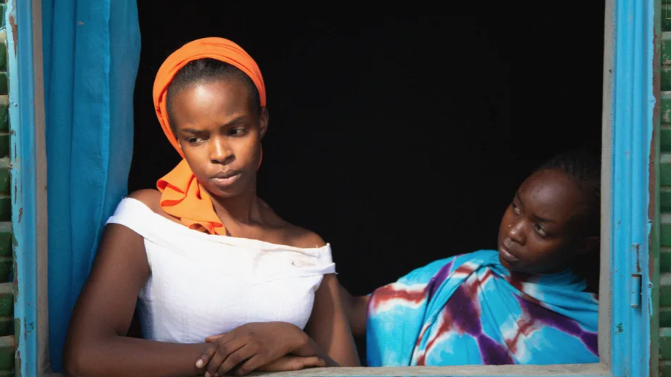 Amina (right, Abakar Souleymane) tries to guide her 15-year-old daughter (Rihane Khalil Alio) through an unexpected pregnancy in the Chadian film Lingui, the Sacred Bonds.