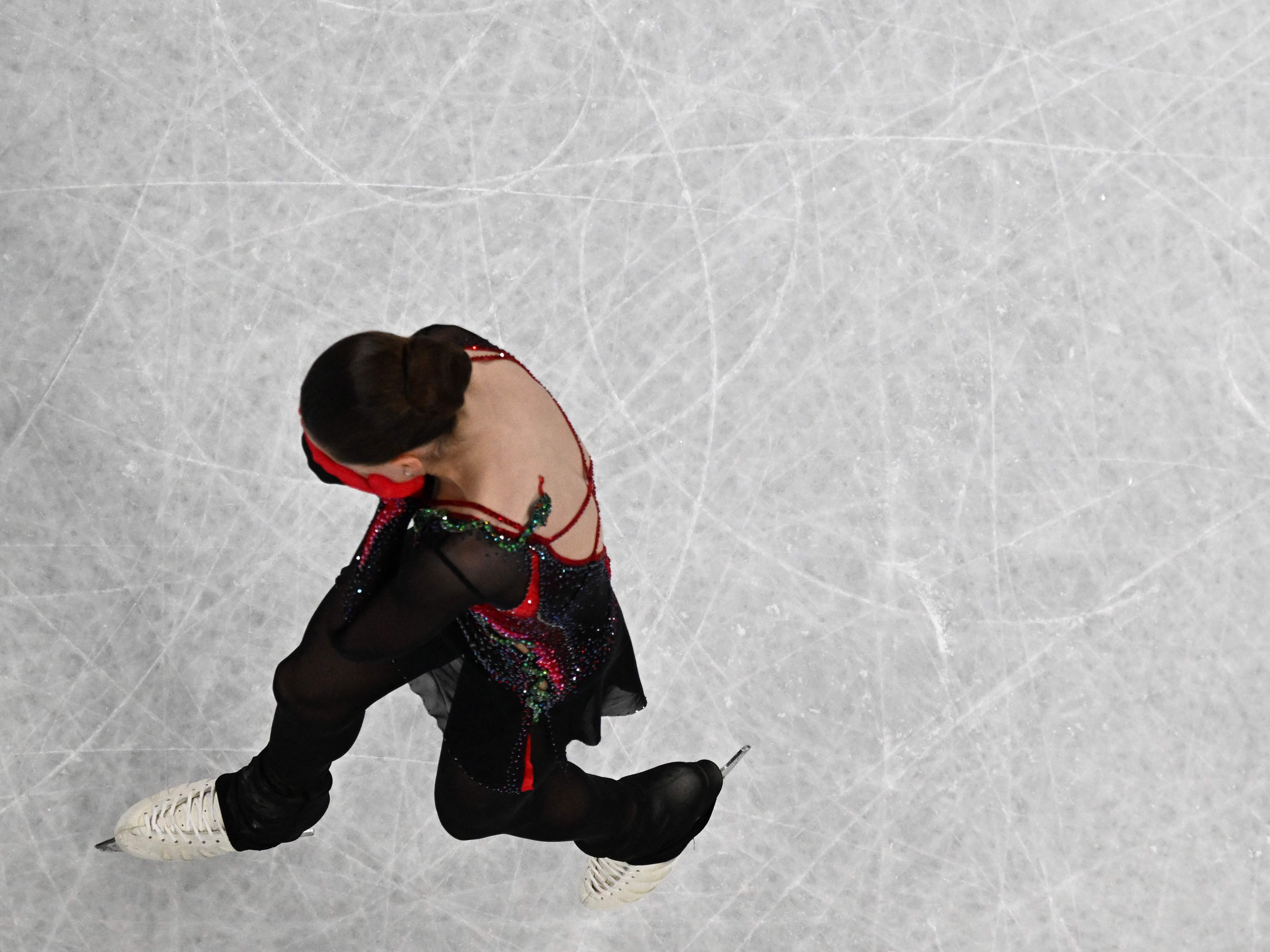 Russia's Kamila Valieva leaves the ice after a disappointing performance in the women's figure skating event during the Beijing 2022 Winter Olympic Games. (AFP via Getty Images)
