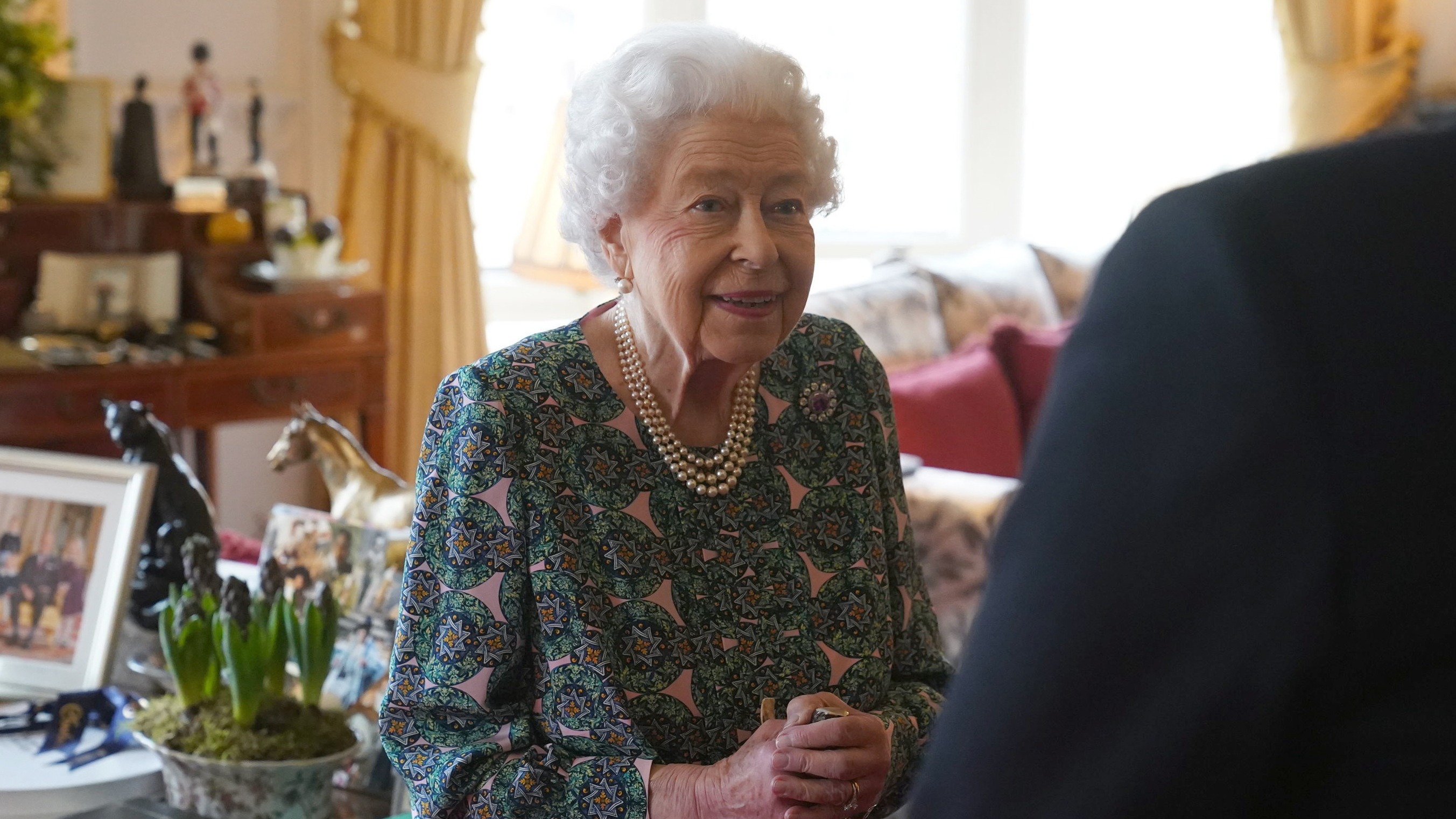 Buckingham Palace said Sunday, Feb. 20, 2022 that Queen Elizabeth II tested positive for COVID-19, has mild symptoms and will continue with duties.