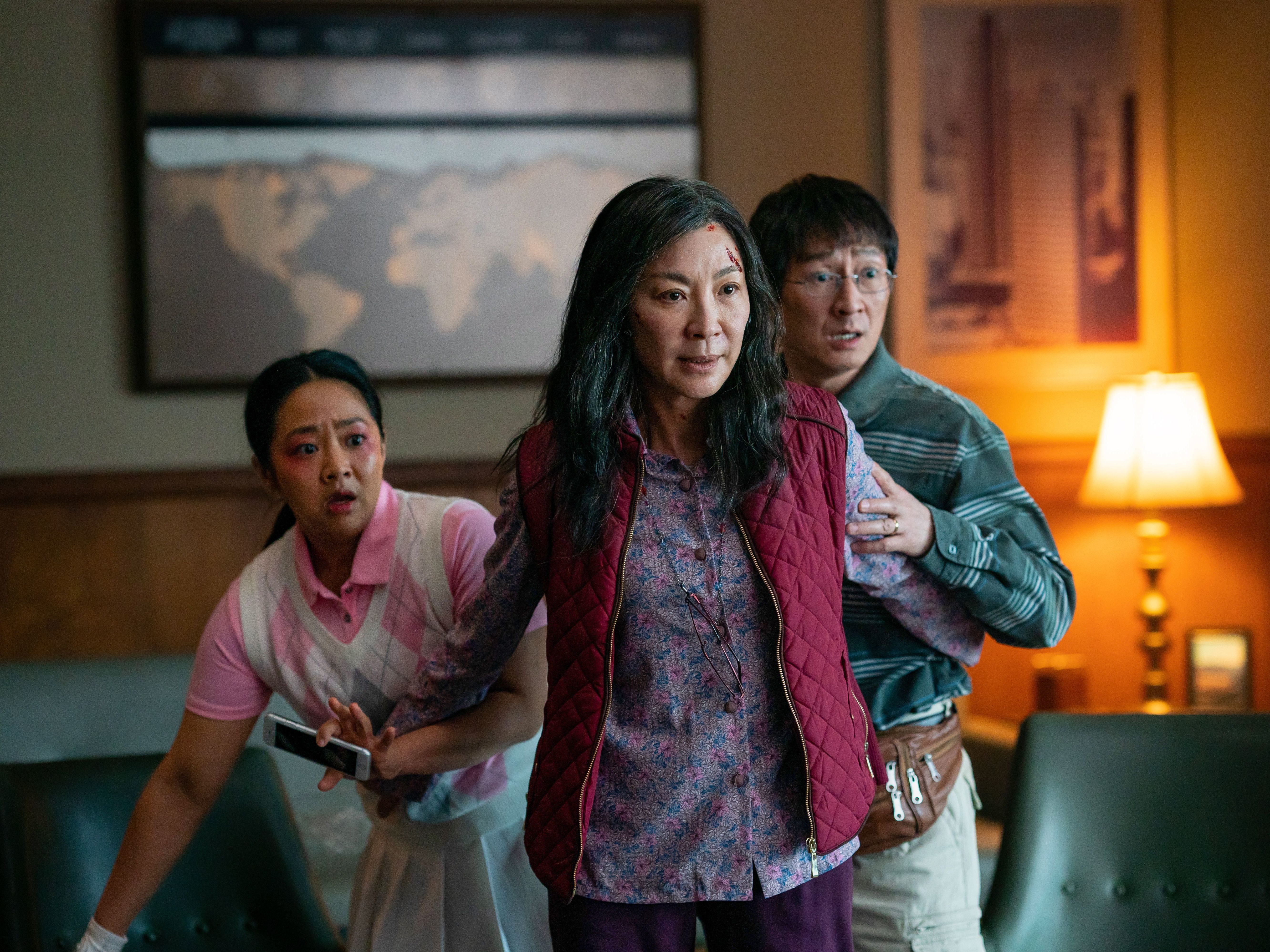 Michelle Yeoh (front), Ke Huy Quan, and Stephanie Hsu in <em>Everything Everywhere All at Once.</em> (A24)