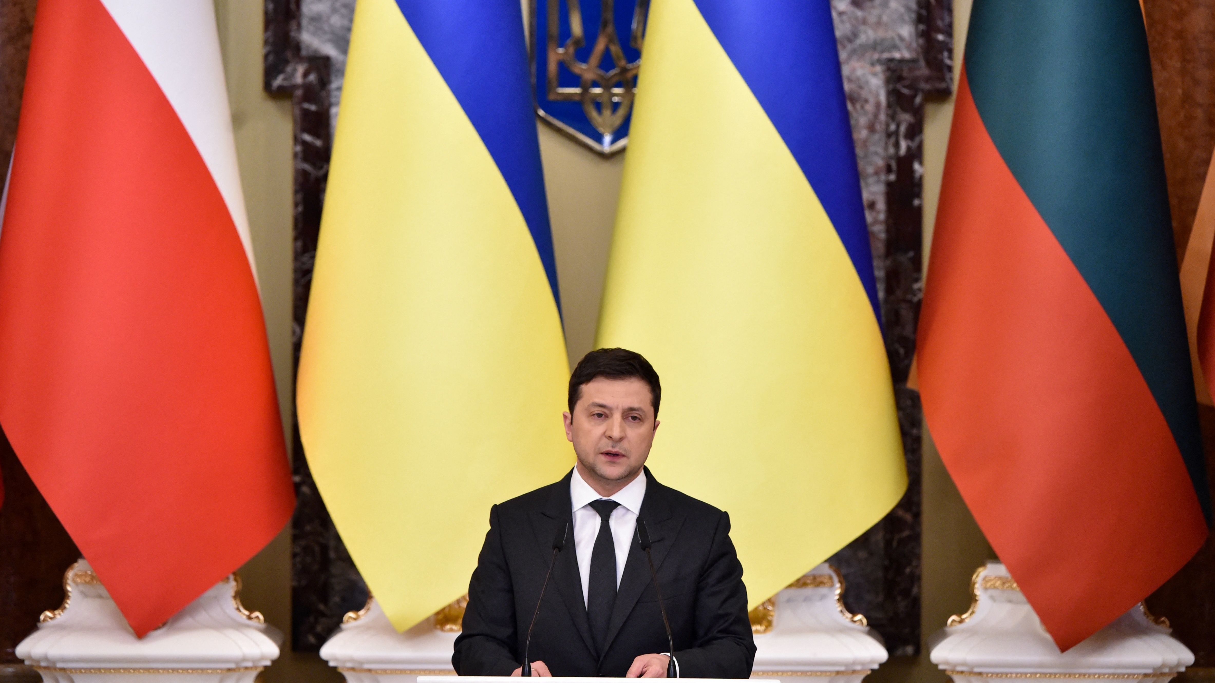 Ukrainian President Volodymyr Zelenskyy, shown here at a  press conference Wednesday, is moving to declare a state of emergency.