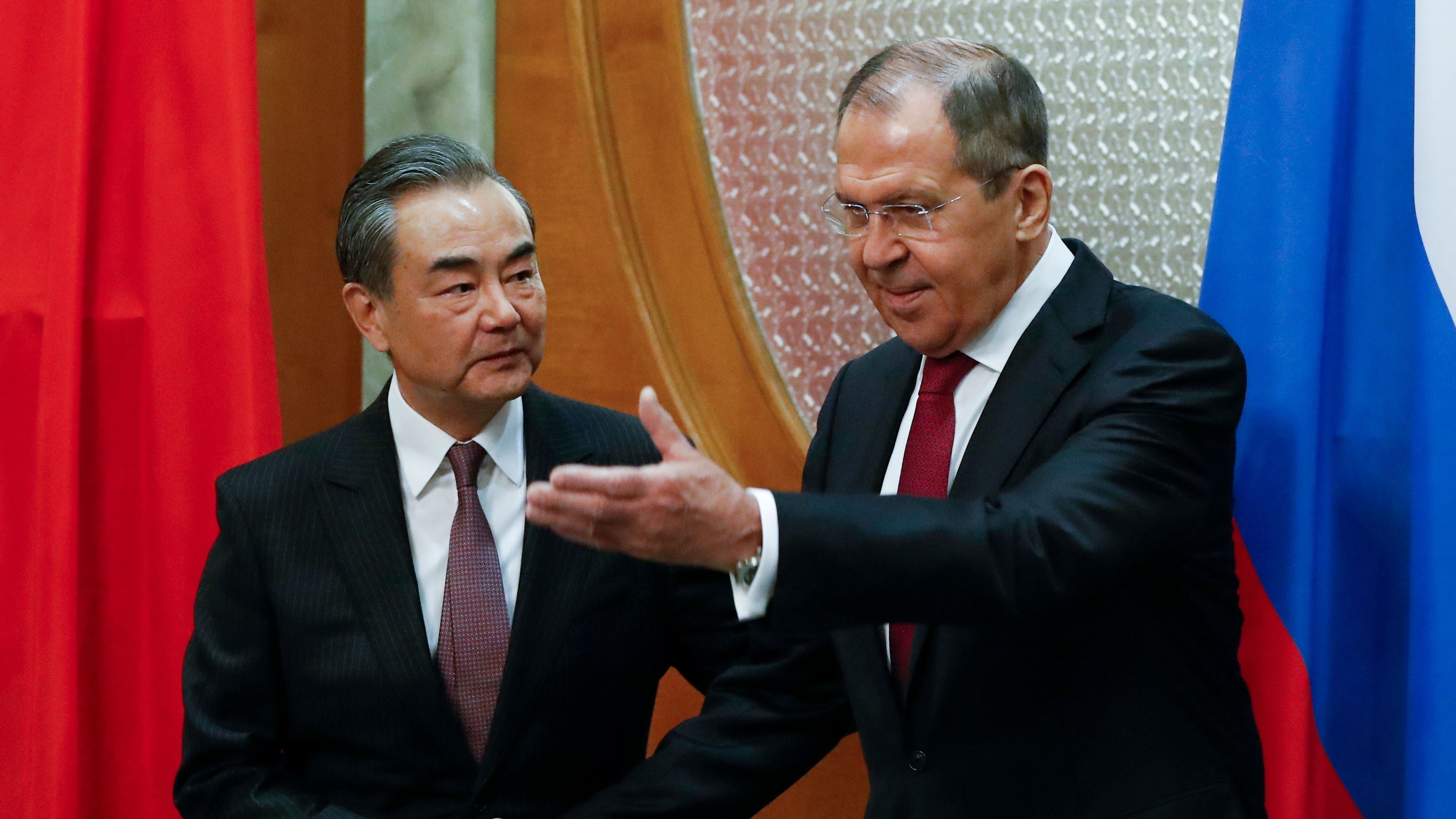 Russian Foreign Minister Sergei Lavrov, right, is shown welcoming his Chinese counterpart Wang Yi during a meeting in Sochi, Russia, on May 13, 2019.